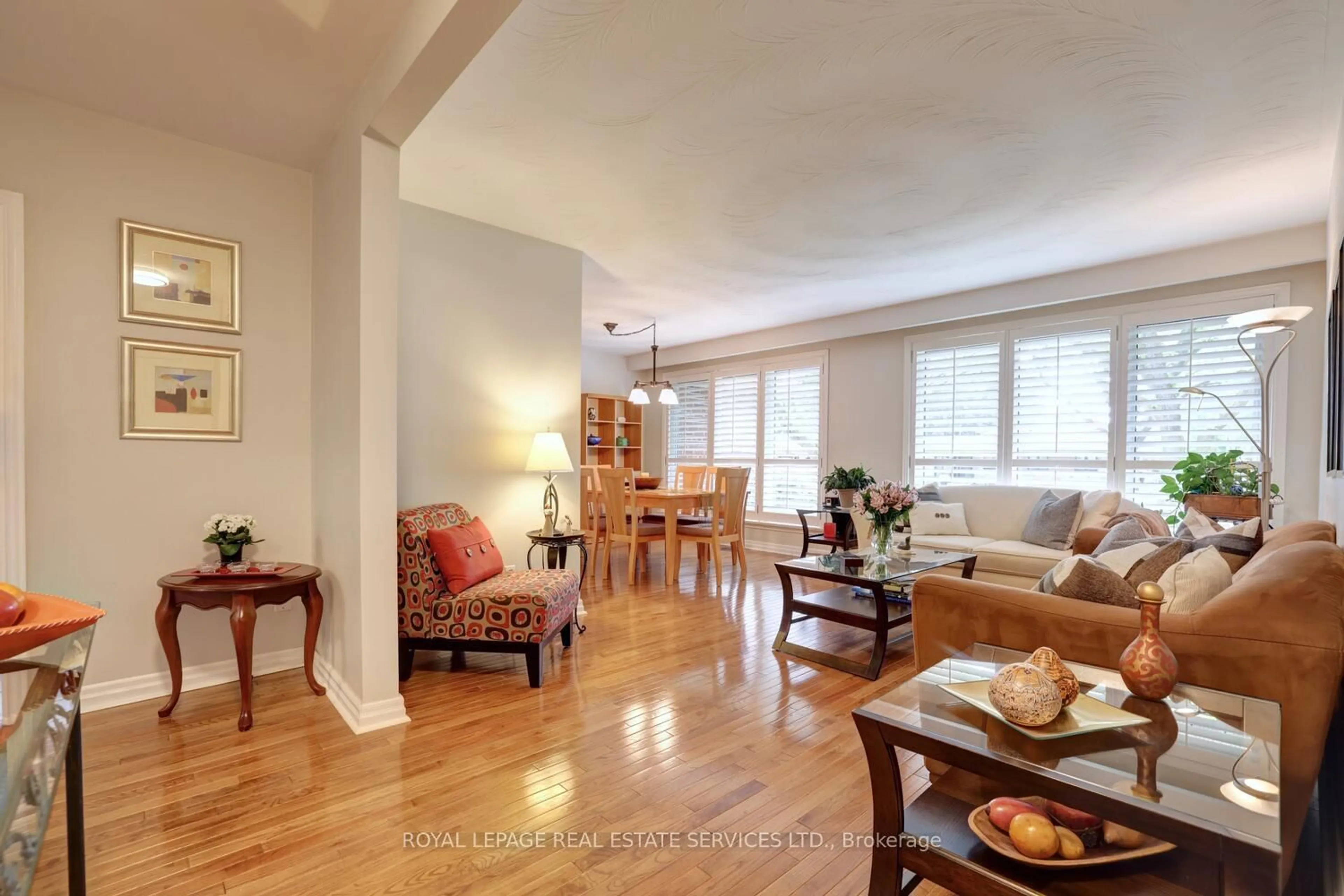 Living room with furniture, wood/laminate floor for 26 Cromer Pl, Toronto Ontario M9R 2E1