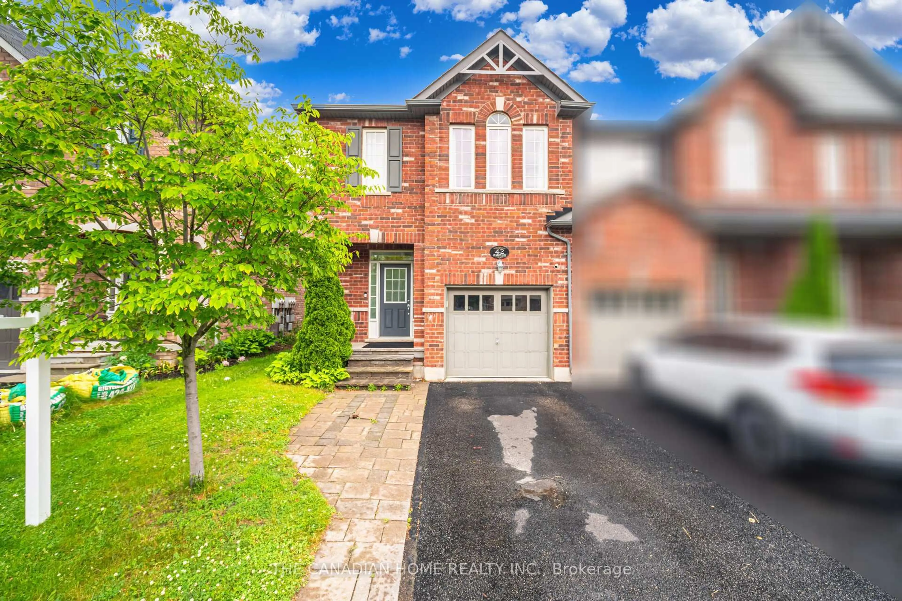 Home with brick exterior material, street for 651 Farmstead Dr #42, Milton Ontario L9T 7W2