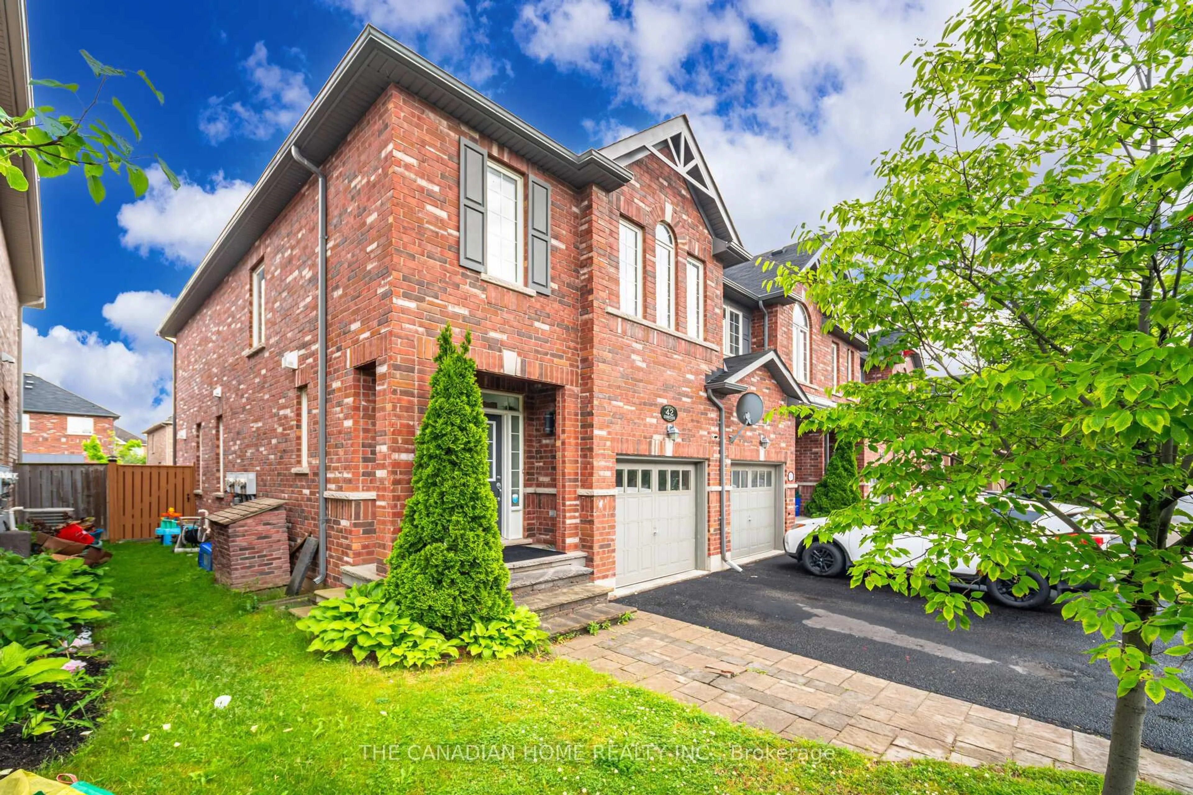 Home with brick exterior material, street for 651 Farmstead Dr #42, Milton Ontario L9T 7W2