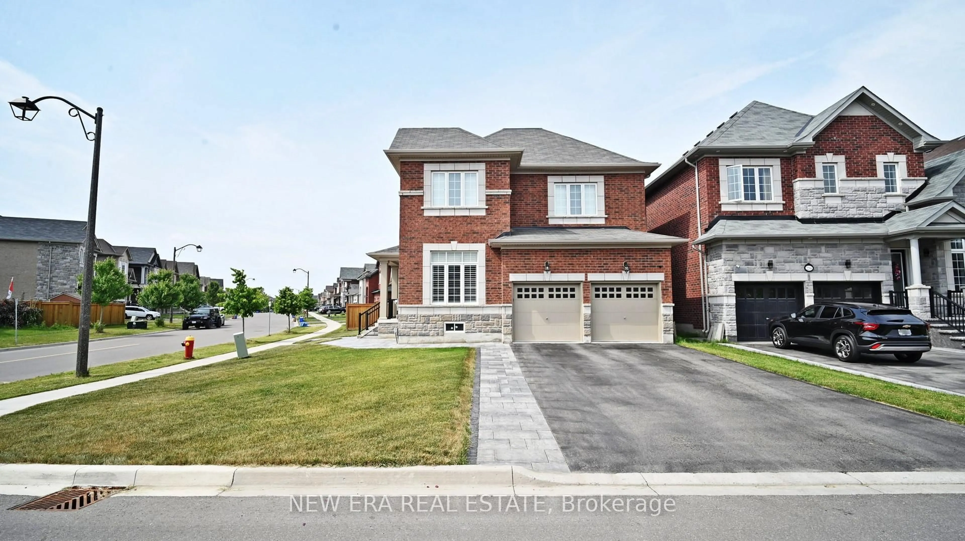 Home with brick exterior material, street for 77 Wildflower Lane, Halton Hills Ontario L7G 0A5