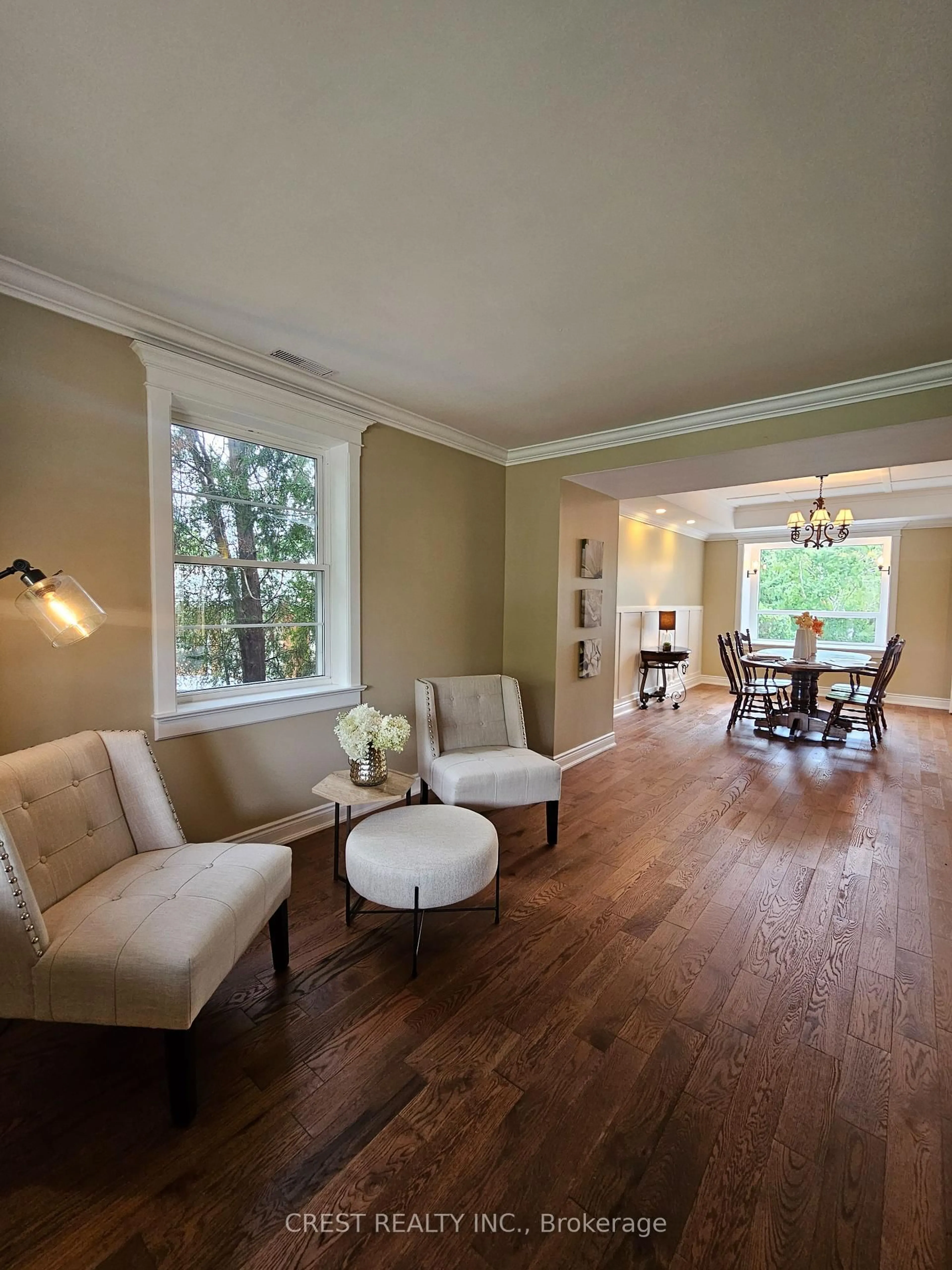 Living room with furniture, wood/laminate floor for 25 Waltham Dr, Toronto Ontario M9V 1S6