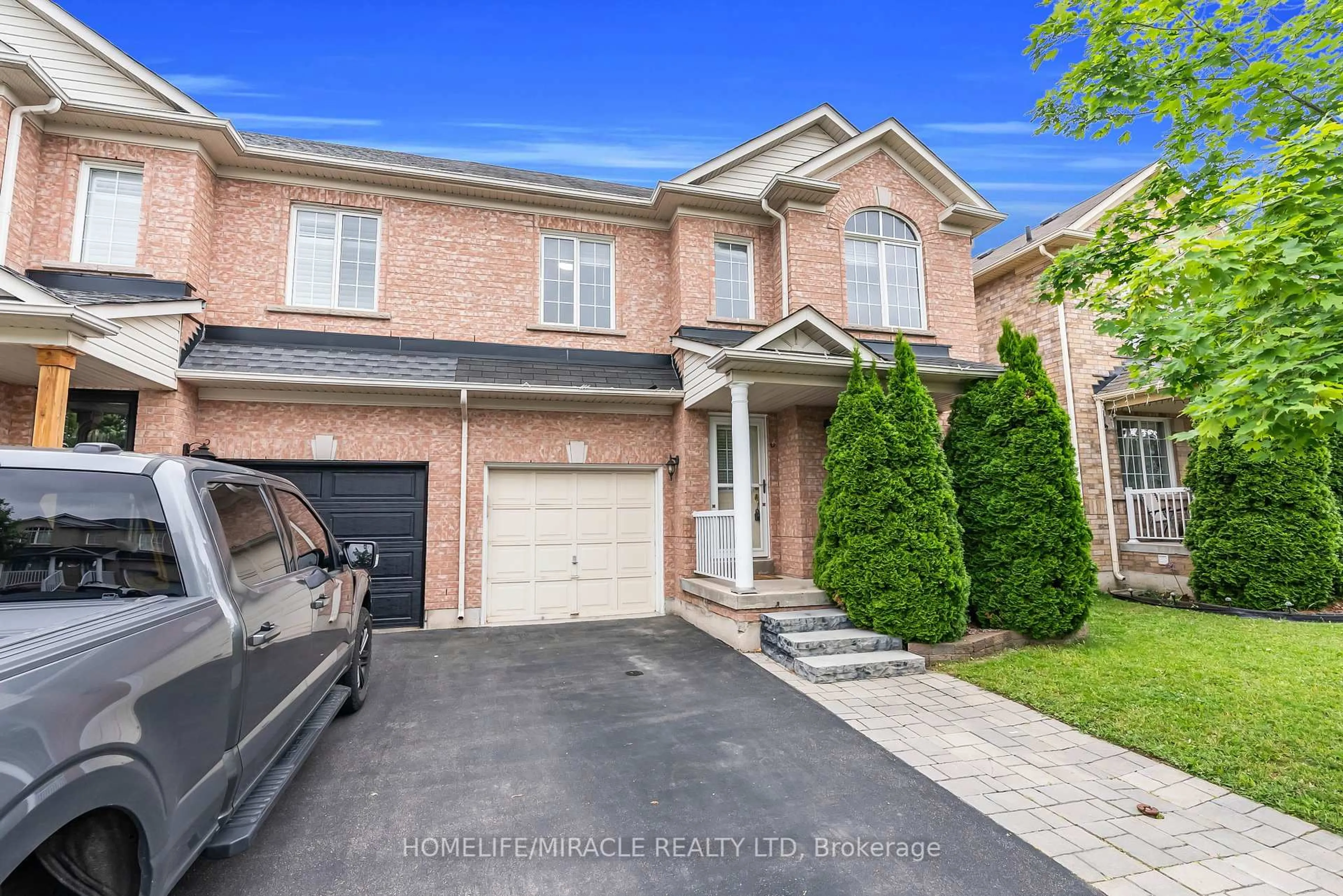 Home with brick exterior material, street for 14 Olivett Lane, Brampton Ontario L7A 2X3