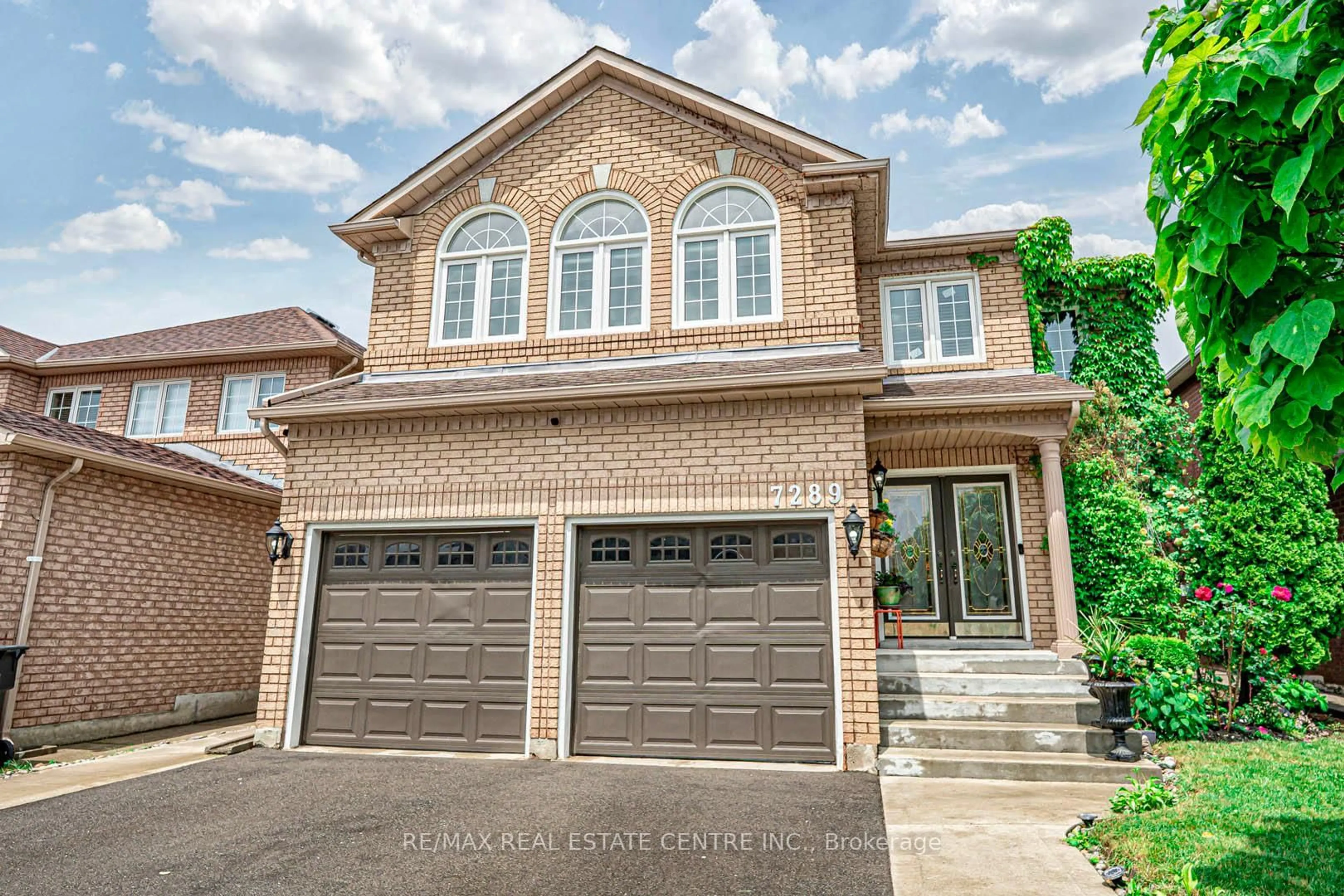 Home with brick exterior material, street for 7289 Terragar Blvd, Mississauga Ontario L5N 7L8