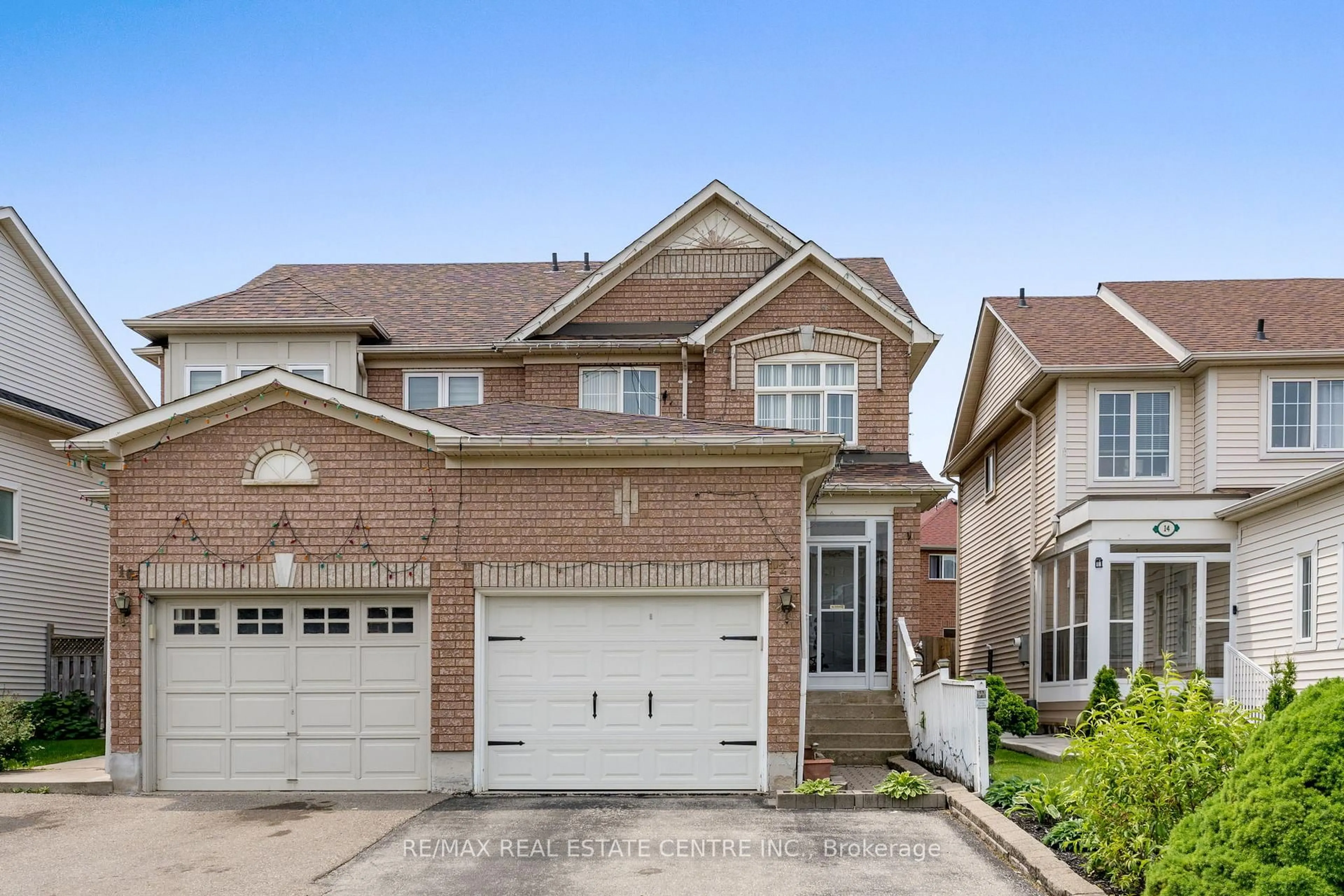 Home with brick exterior material, street for 12 Tiller Tr, Brampton Ontario L6X 4R2