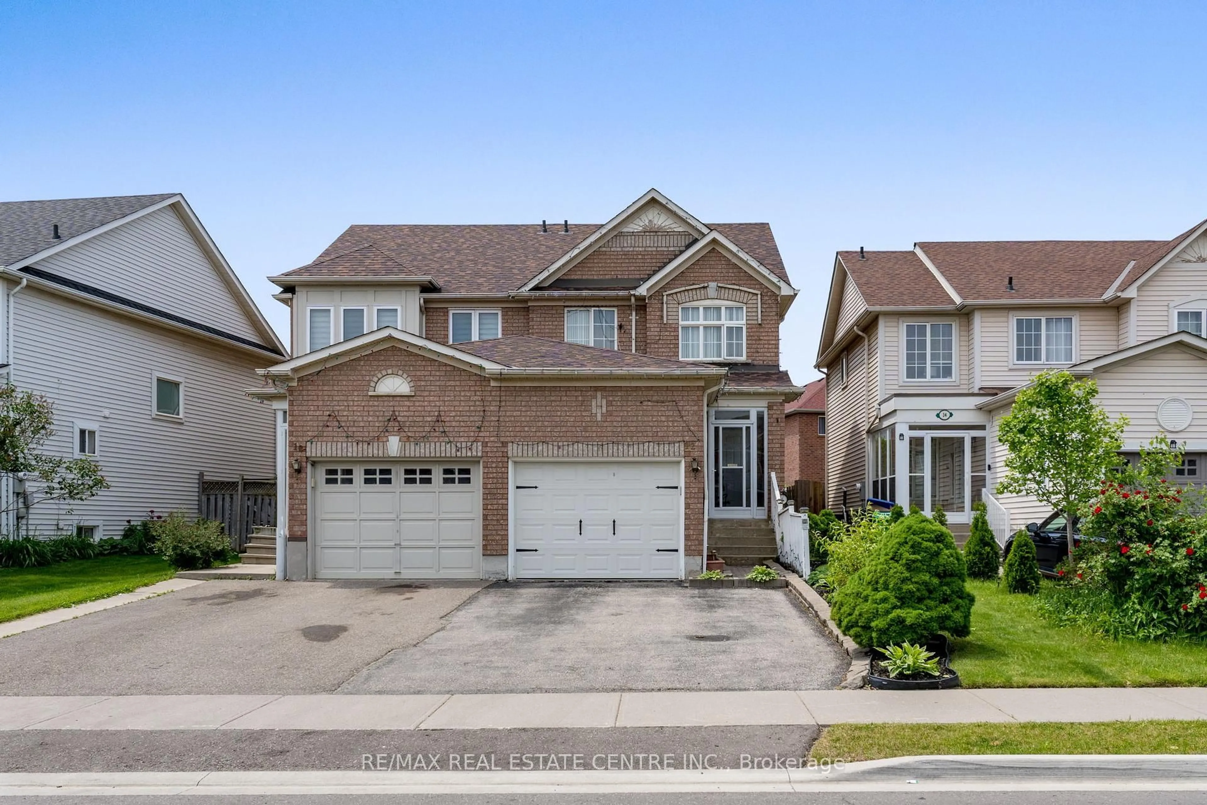 Home with brick exterior material, street for 12 Tiller Tr, Brampton Ontario L6X 4R2