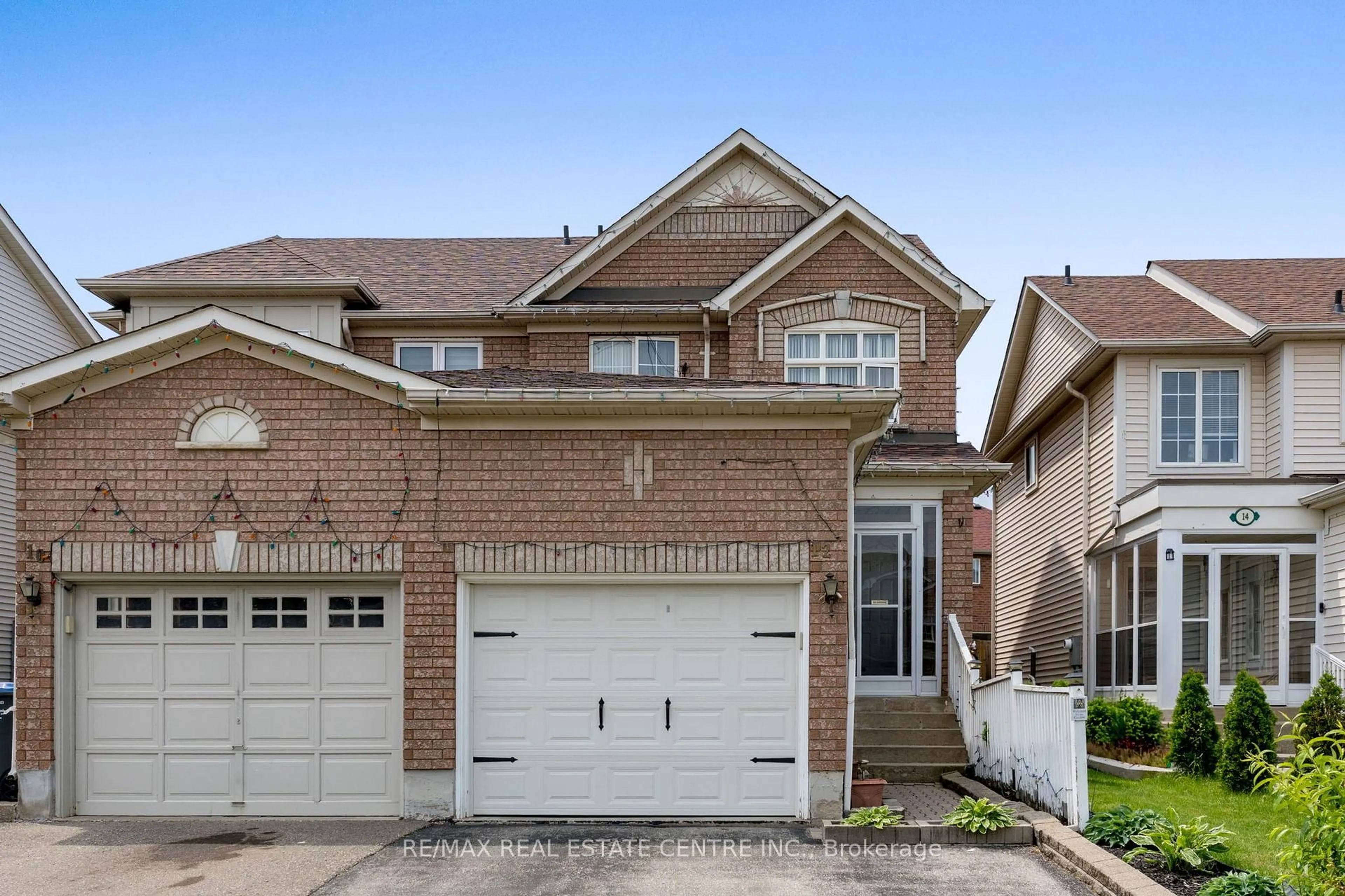 Home with brick exterior material, street for 12 Tiller Tr, Brampton Ontario L6X 4R2