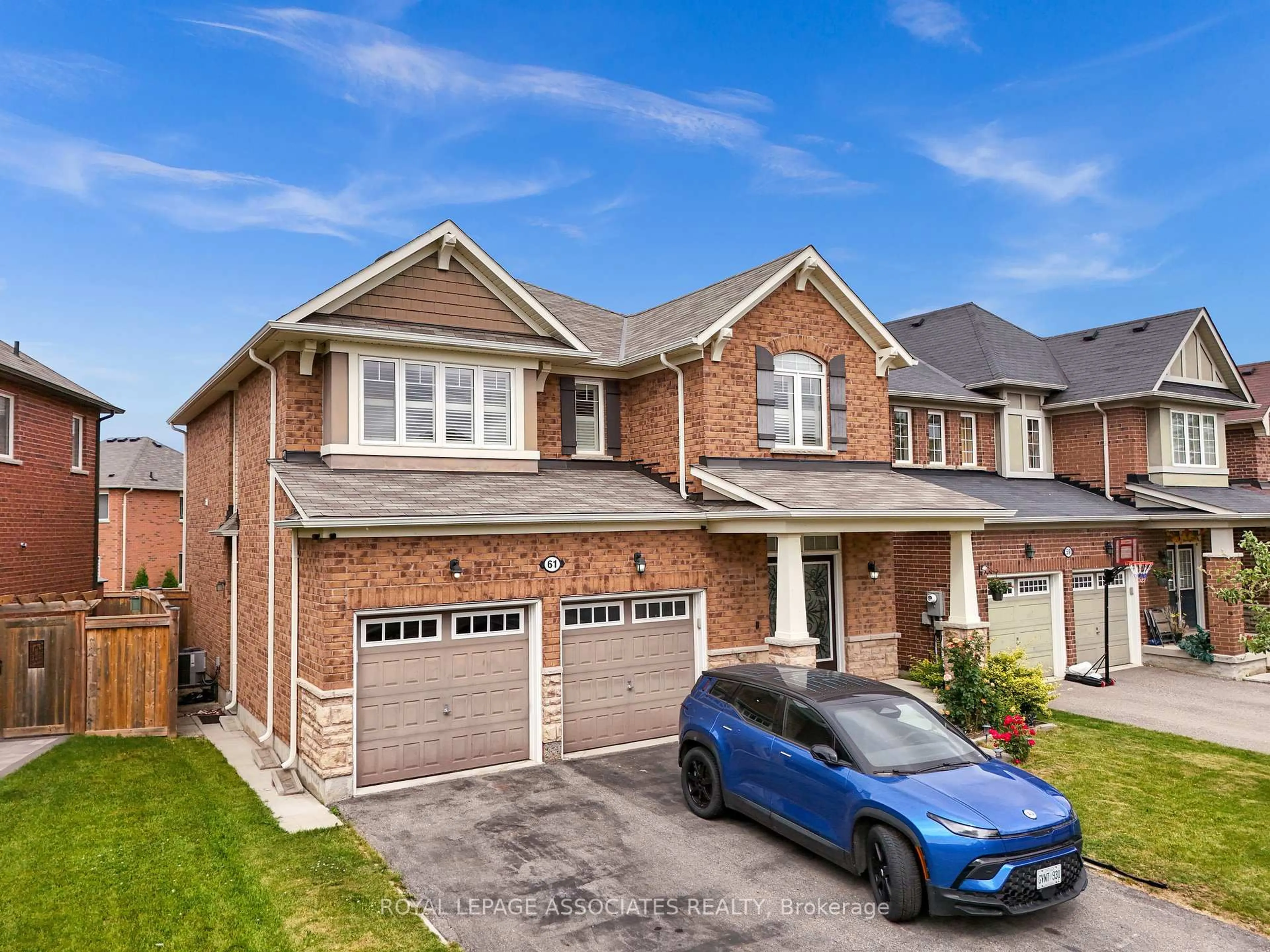 Home with brick exterior material, street for 61 Miracle Tr, Brampton Ontario L7A 0Y7