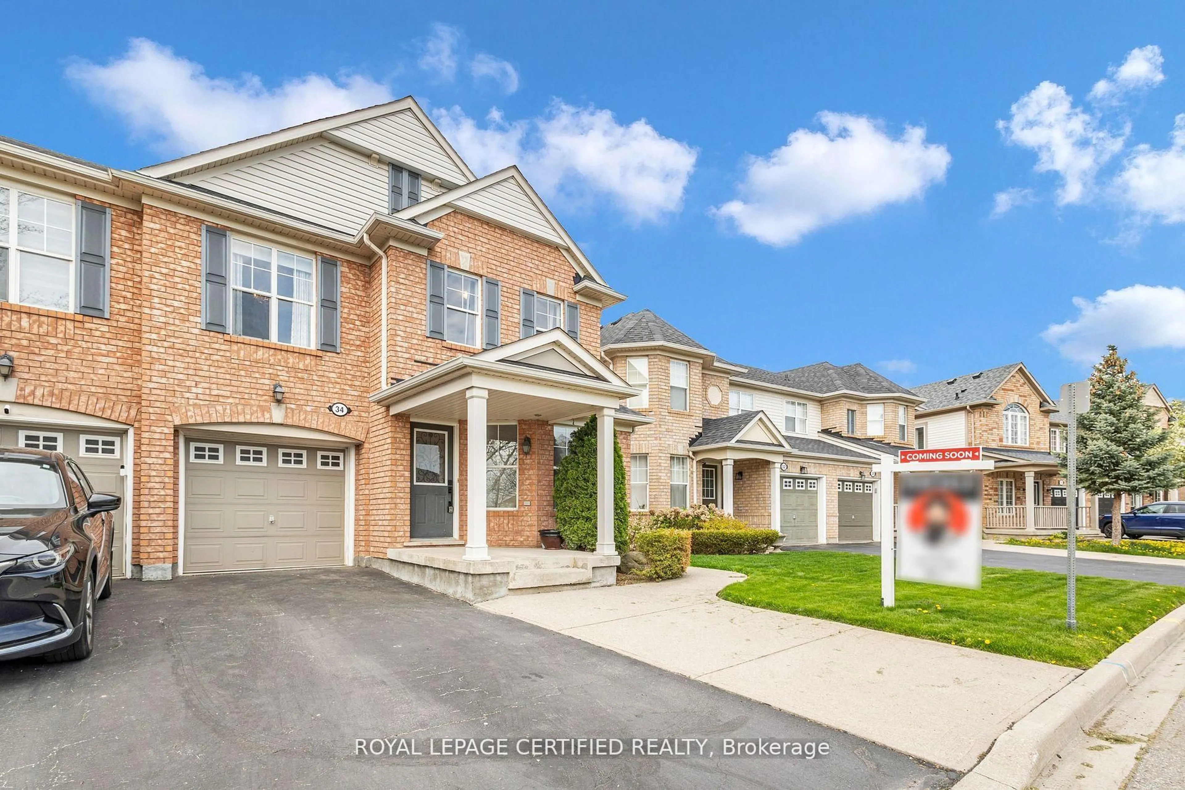 Home with brick exterior material, street for 34 Tawnie Cres, Brampton Ontario L6X 0L7