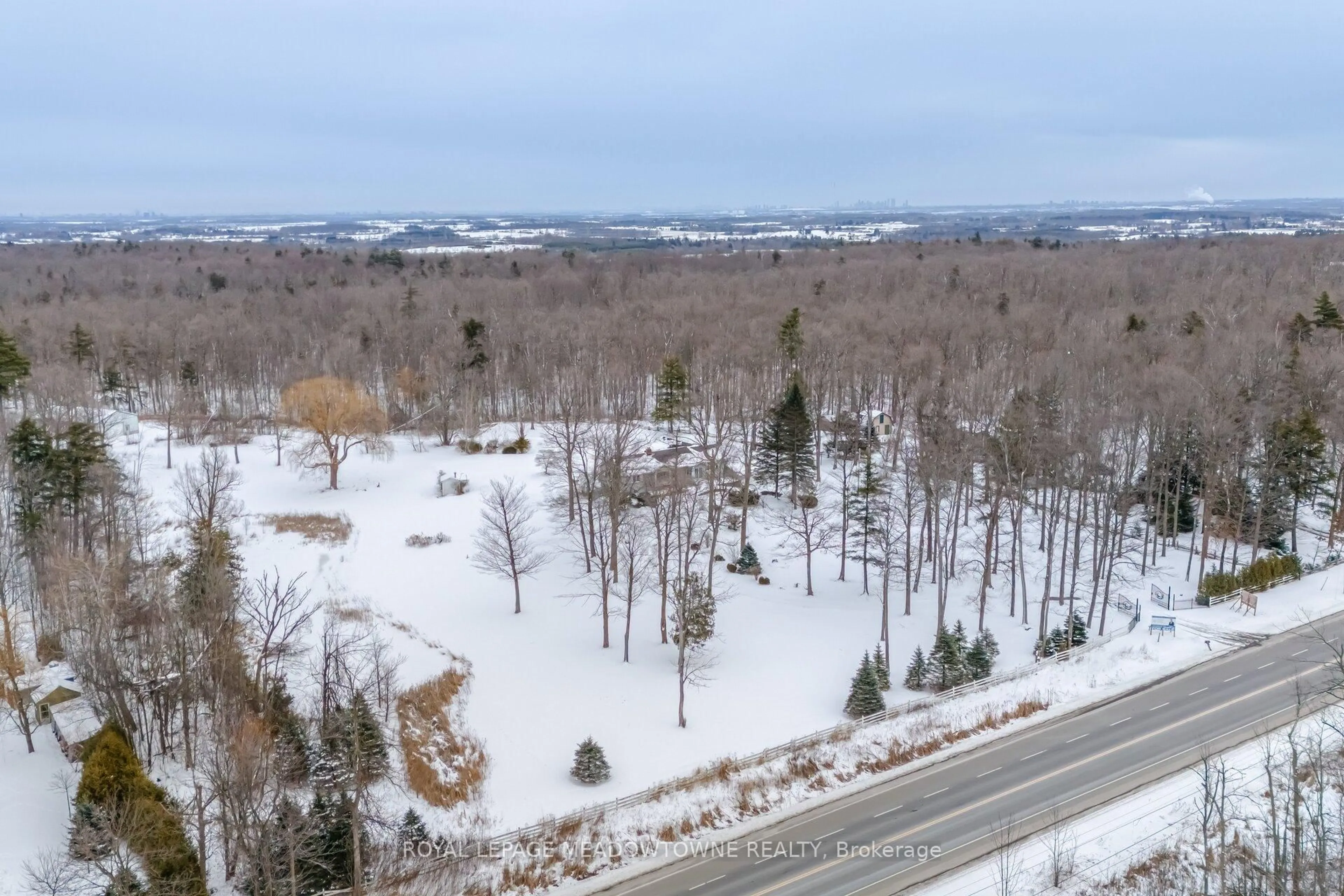 A pic from outside/outdoor area/front of a property/back of a property/a pic from drone, forest/trees view for 11255 Regional Road 25 Rd, Halton Hills Ontario L7J 2M1