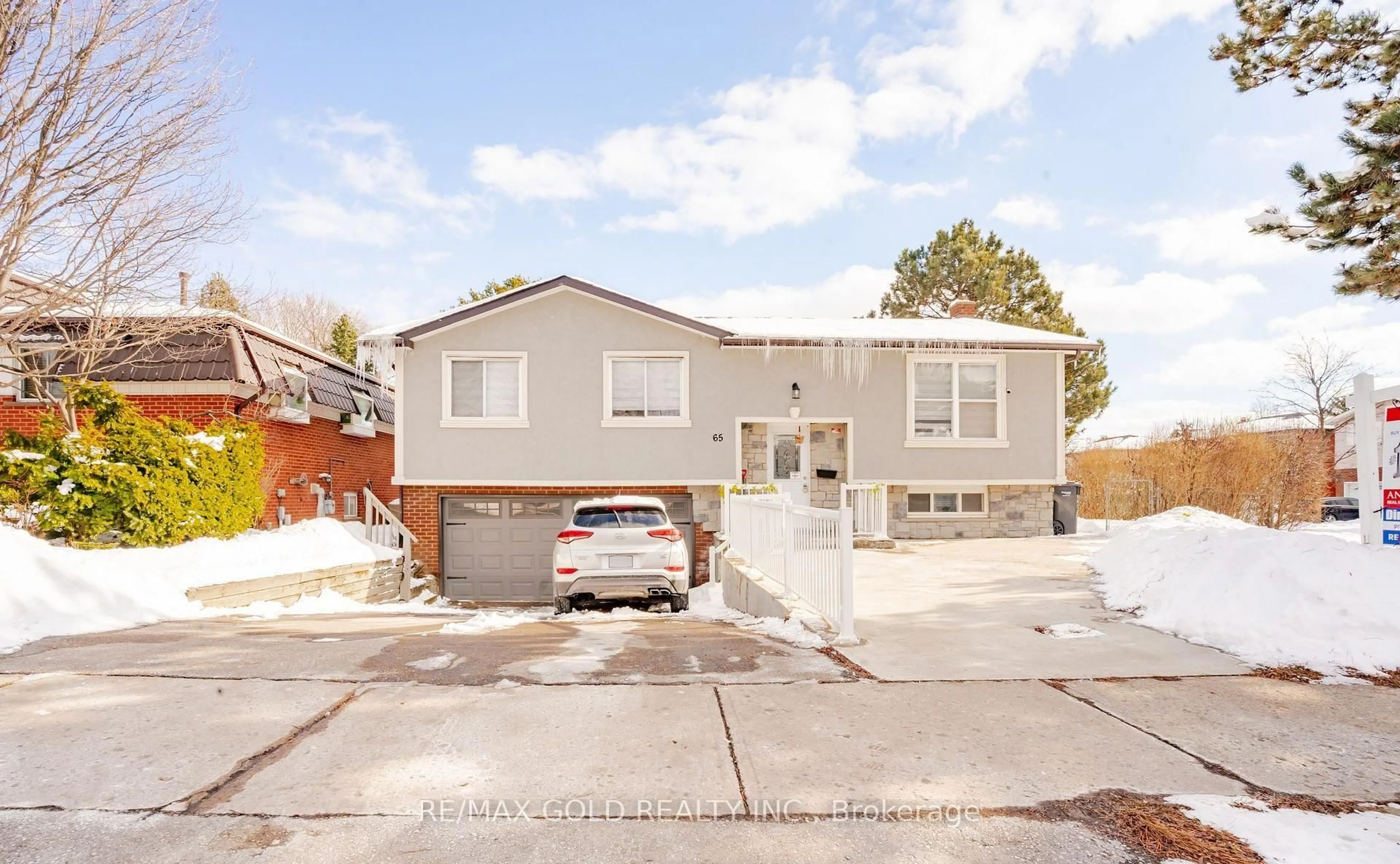 Home with brick exterior material, street for 65 Abell Dr, Brampton Ontario L6V 2W1
