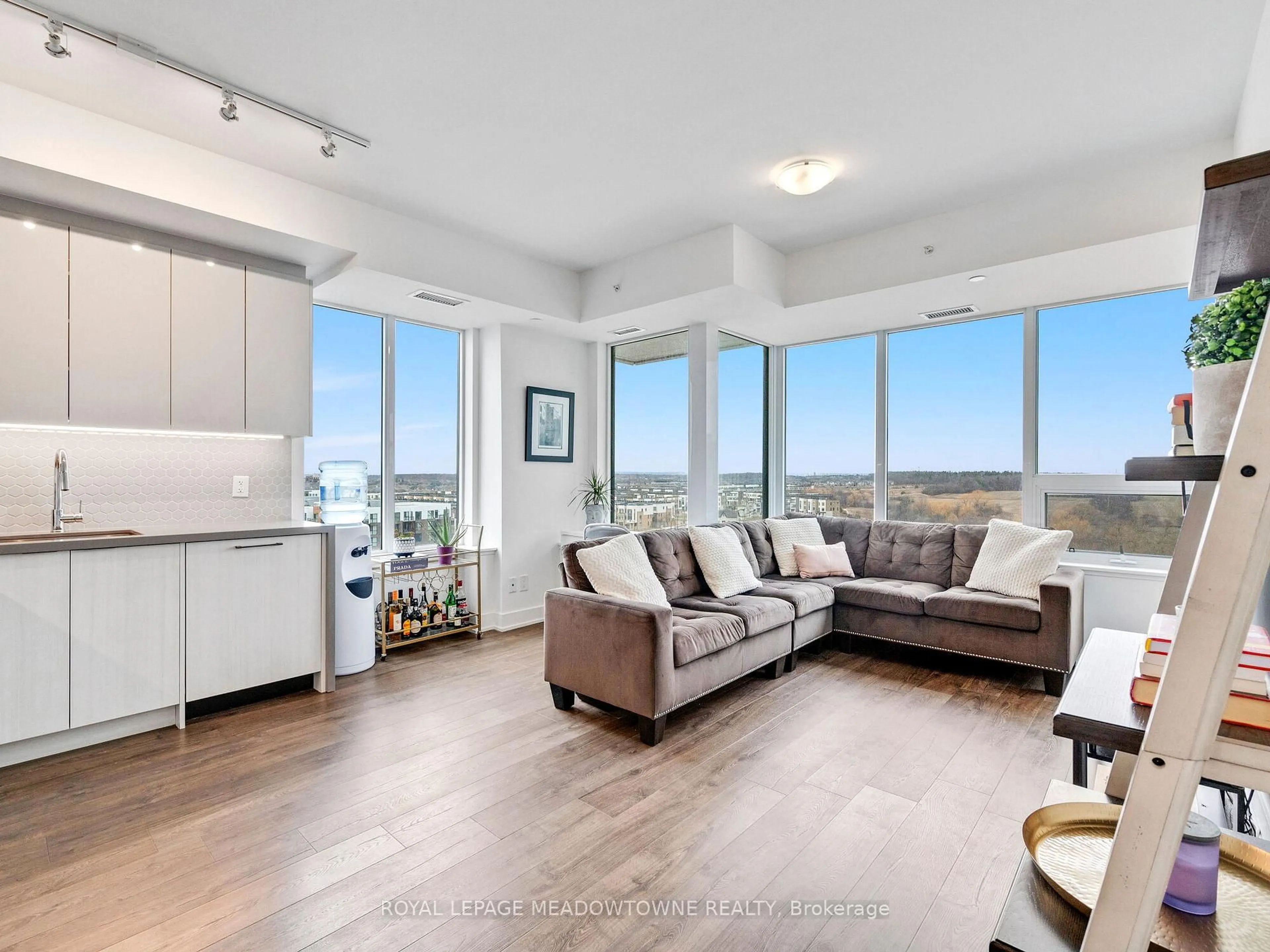 Living room with furniture, unknown for 2489 Taunton Rd #714, Oakville Ontario L6H 3R9