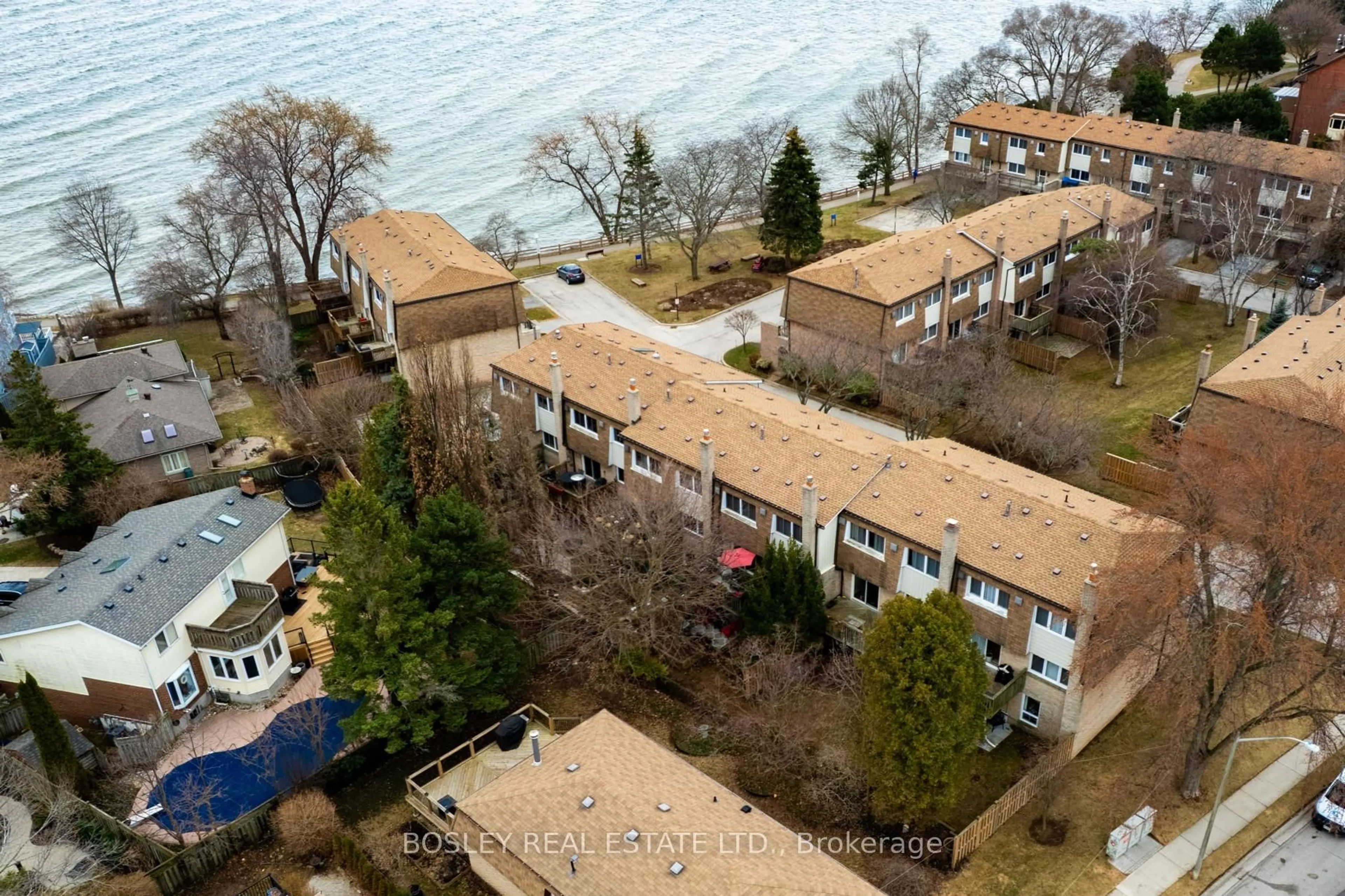 A pic from outside/outdoor area/front of a property/back of a property/a pic from drone, water/lake/river/ocean view for 2098 Marine Dr #3, Oakville Ontario L6L 1B7