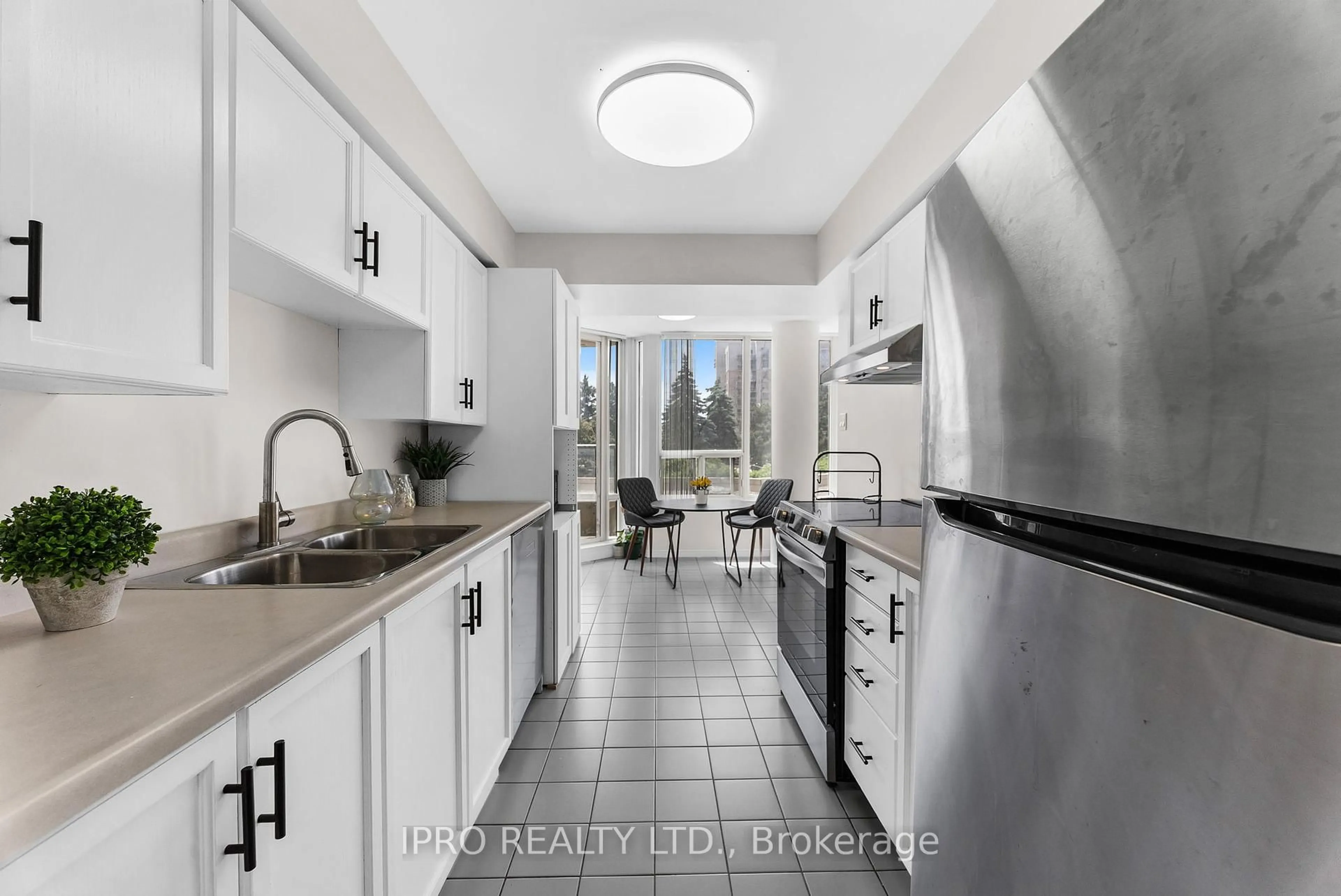 Standard kitchen, ceramic/tile floor for 700 Constellation Dr #210, Mississauga Ontario L5R 3G8