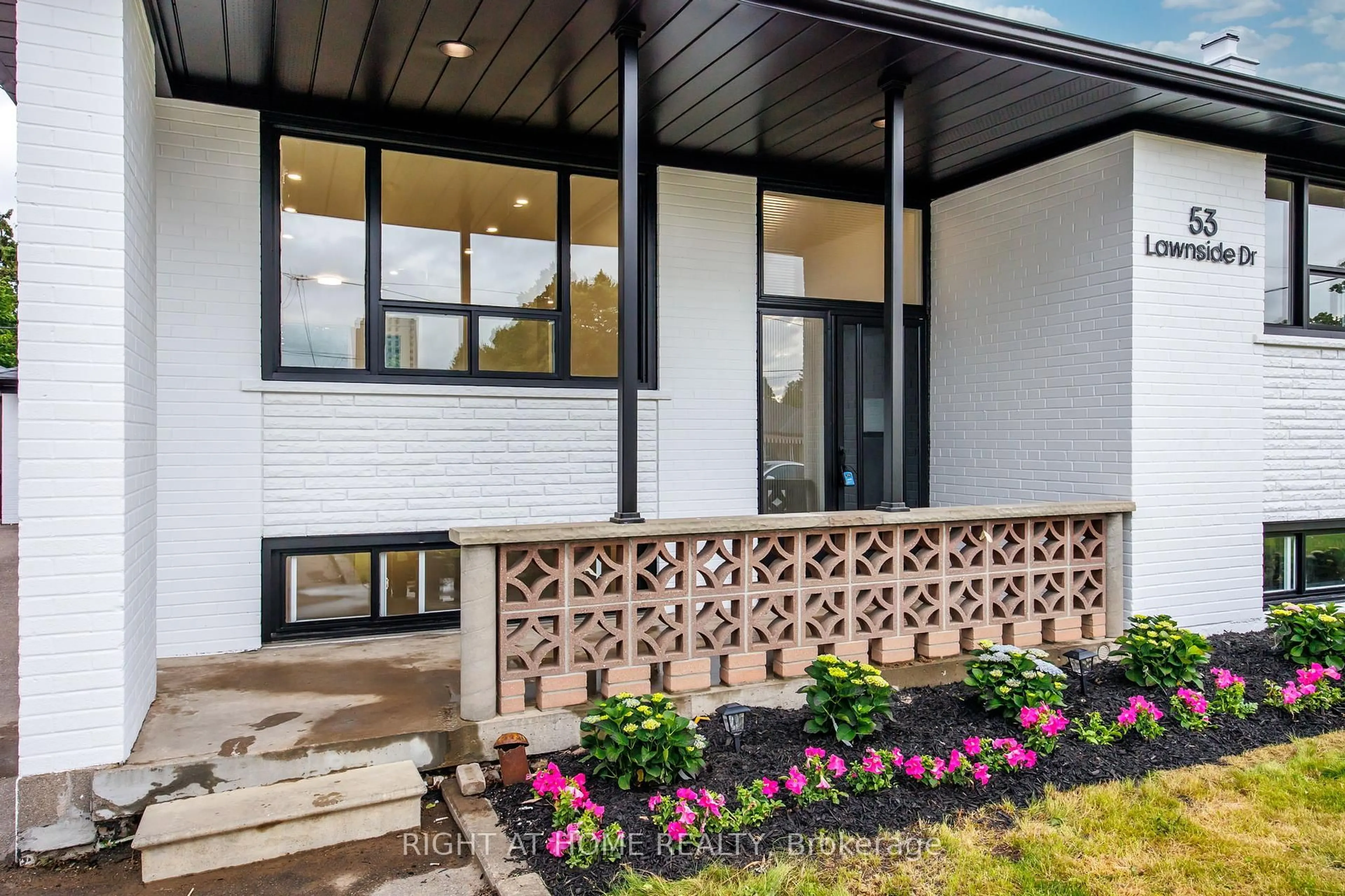 Home with brick exterior material, street for 53 Lawnside Dr, Toronto Ontario M6L 1Z4