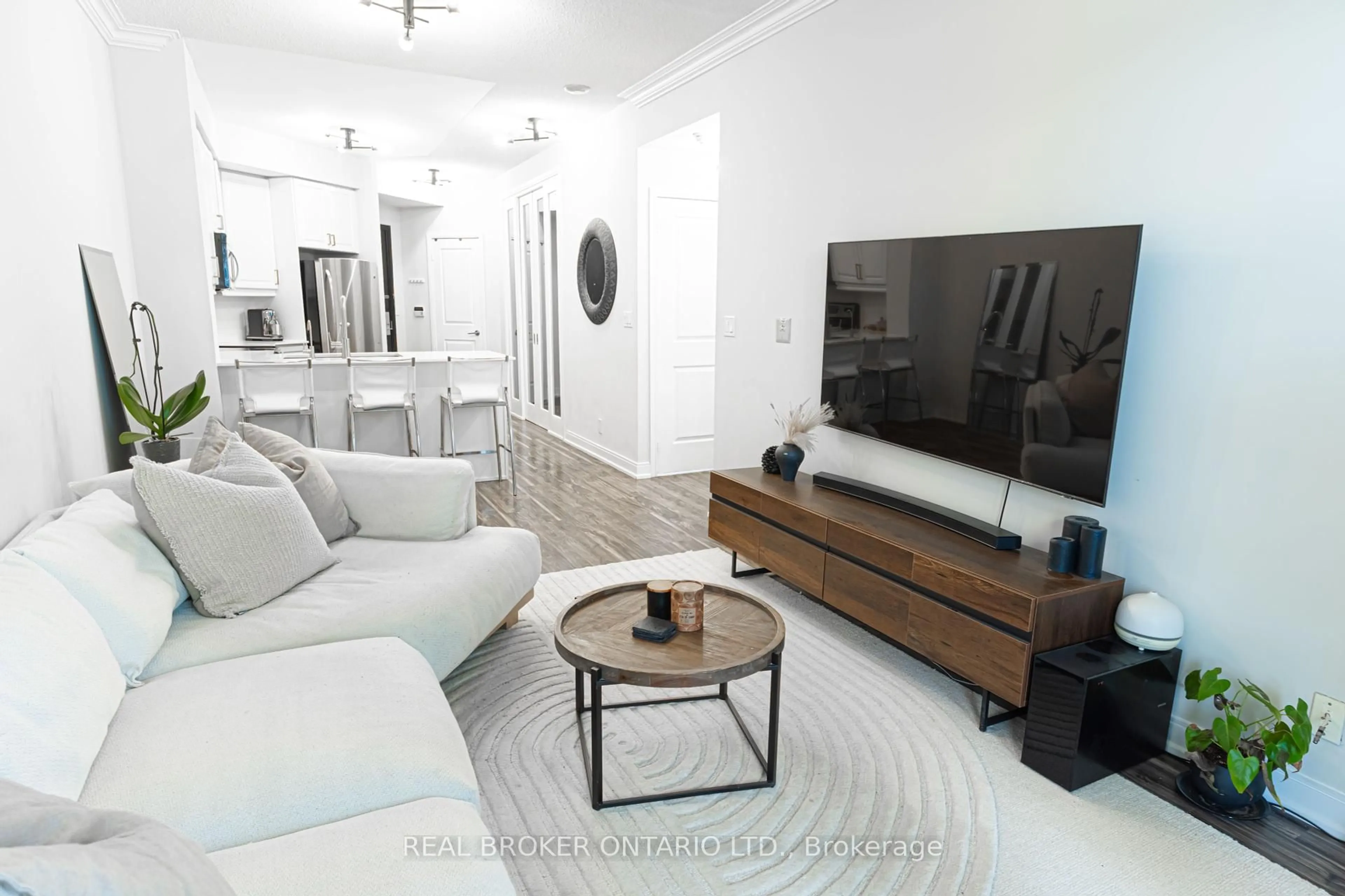 Living room with furniture, unknown for 90 Absolute Ave #2107, Mississauga Ontario L4Z 0A3