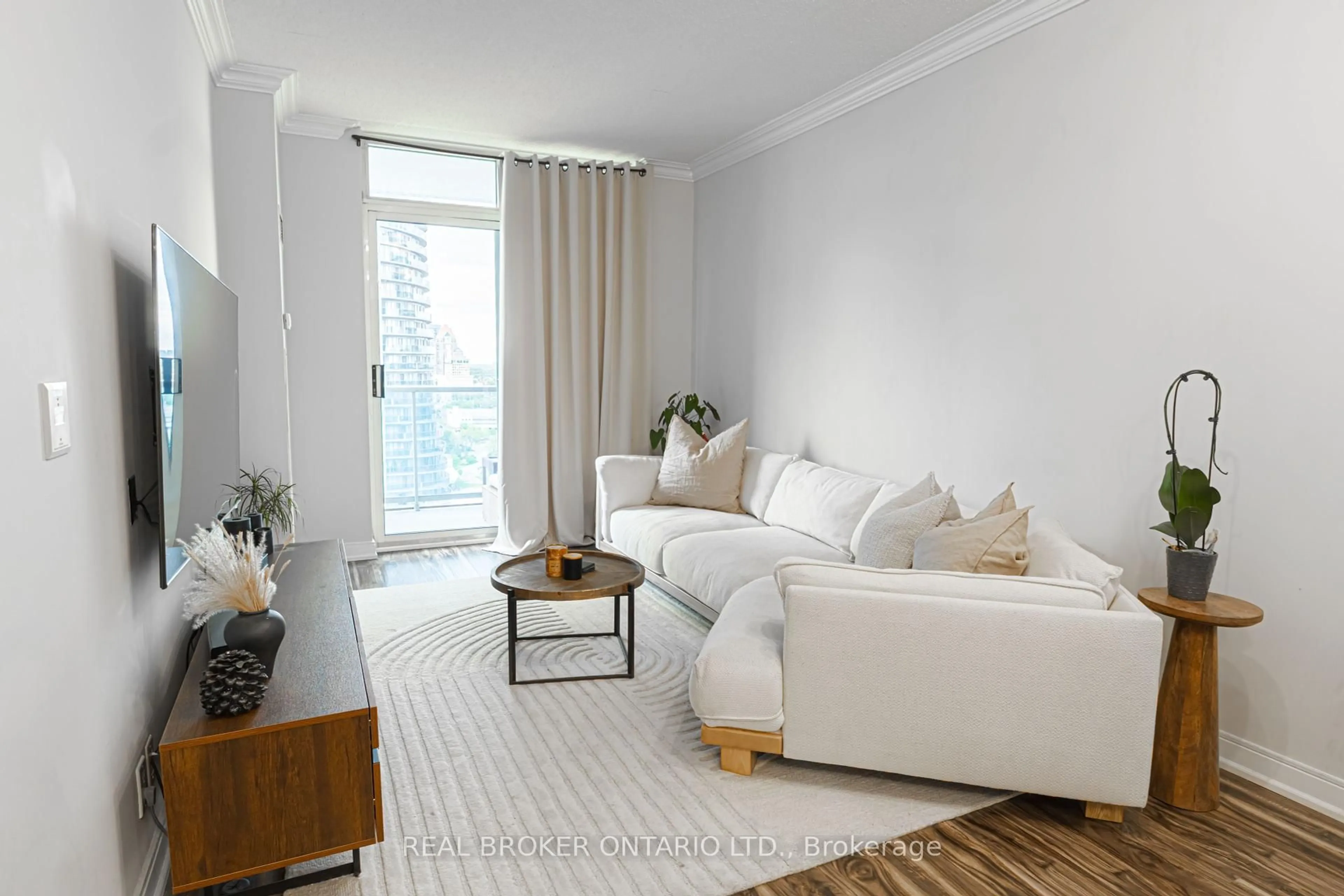 Living room with furniture, unknown for 90 Absolute Ave #2107, Mississauga Ontario L4Z 0A3