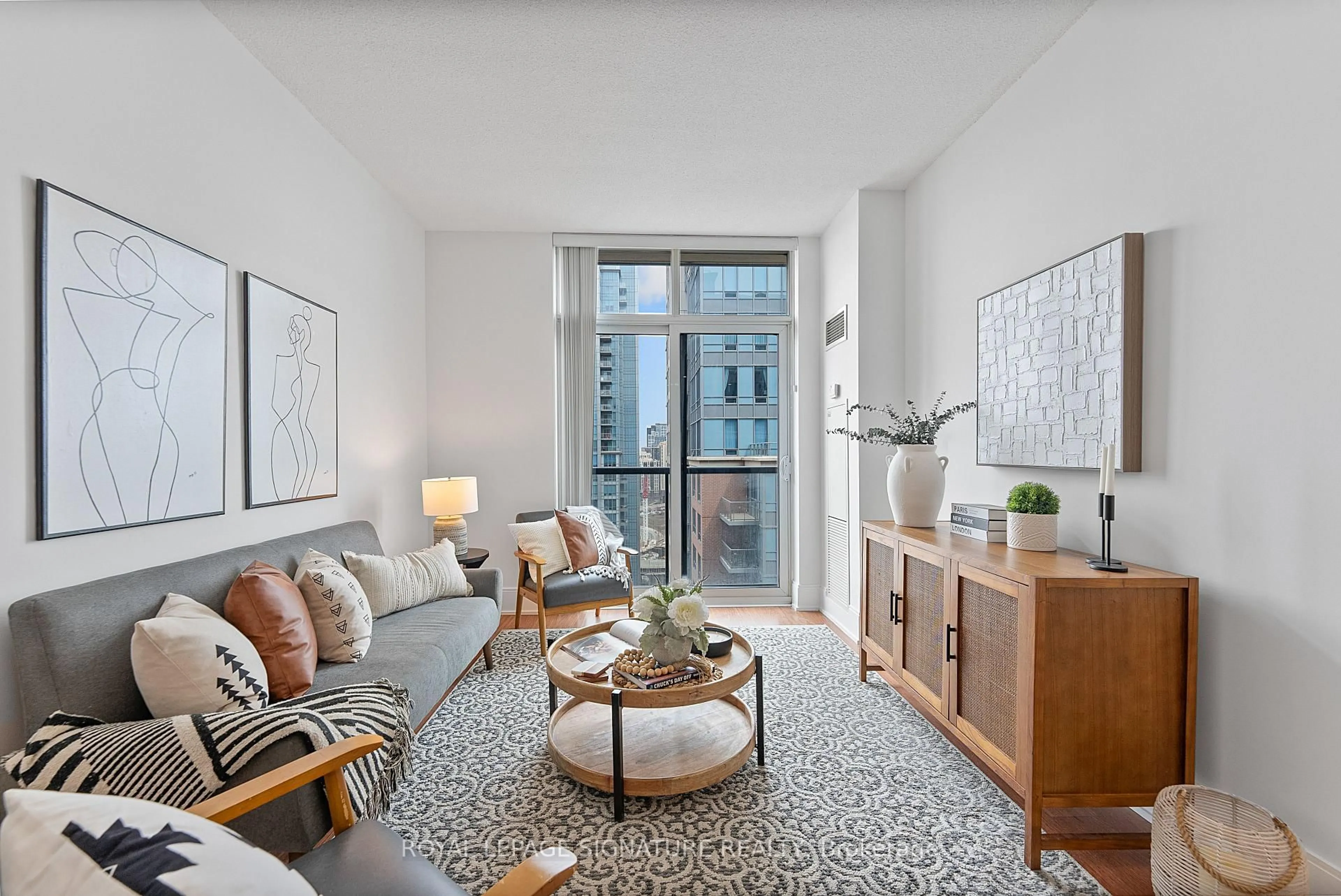Living room with furniture, unknown for 35 Viking Lane #2645, Toronto Ontario M9B 0A2