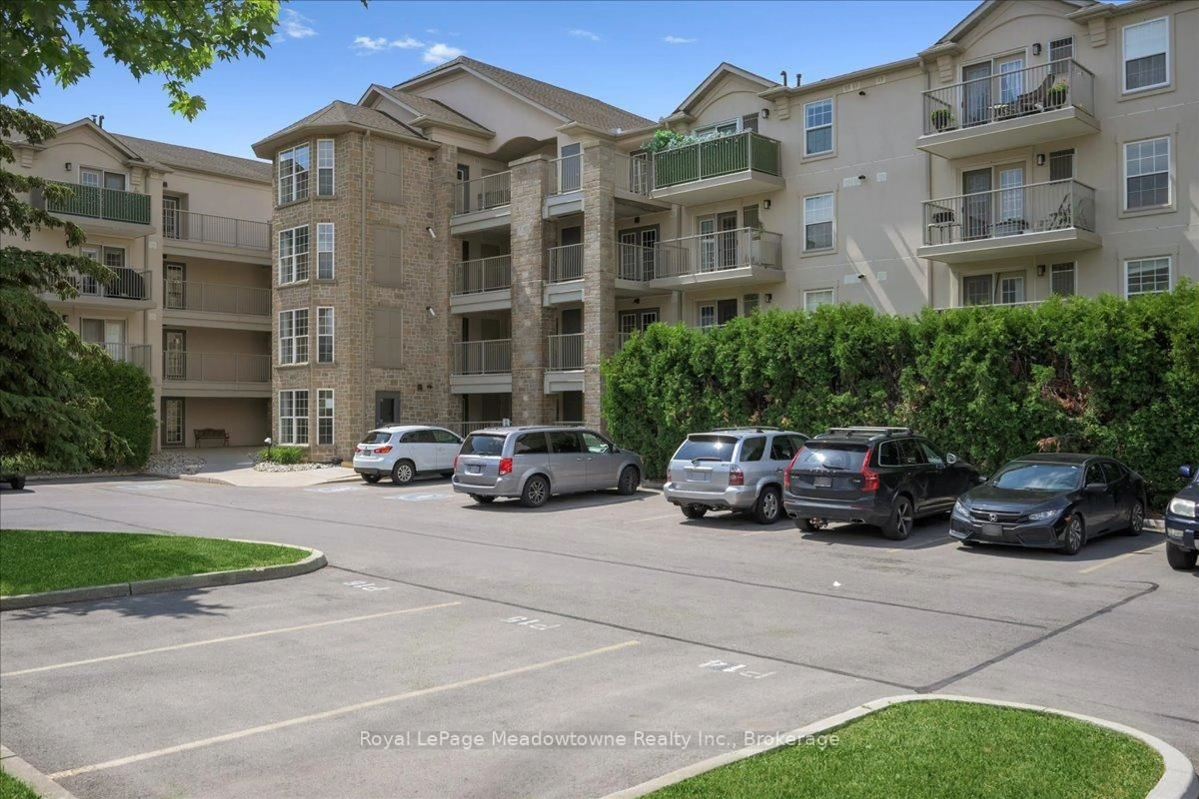 A pic from outside/outdoor area/front of a property/back of a property/a pic from drone, unknown for 1450 Bishops Gate #105, Oakville Ontario L6M 4N1