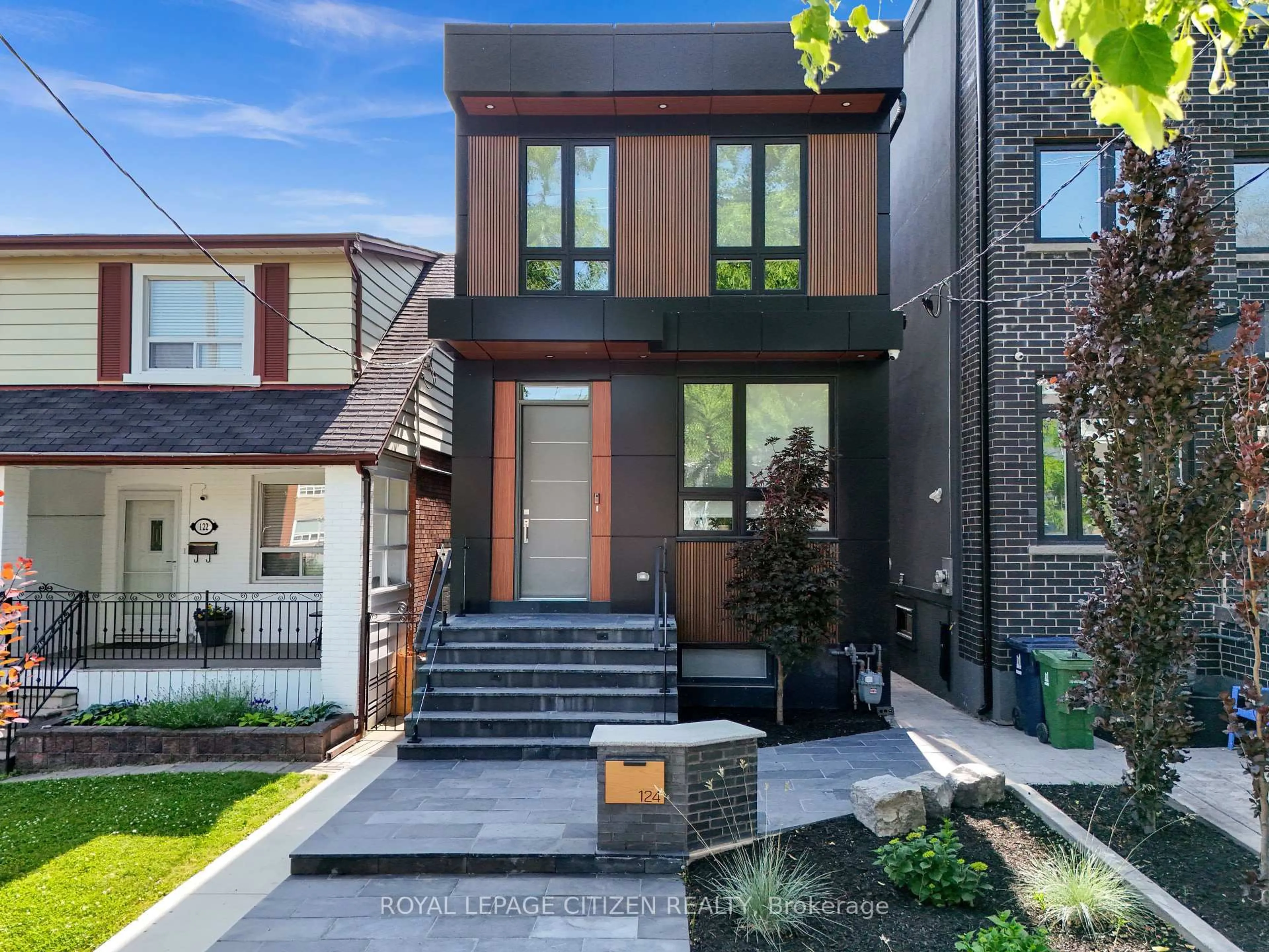 Home with brick exterior material, street for 124 Caledonia Rd, Toronto Ontario M6E 4S7