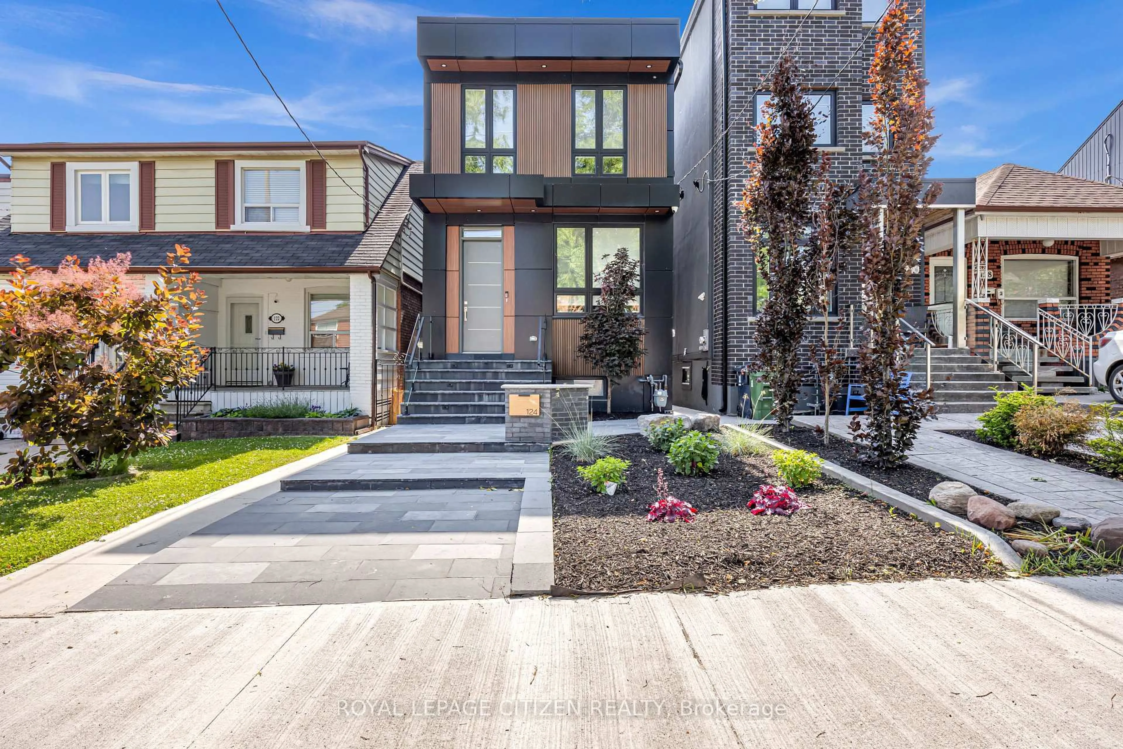 Home with brick exterior material, street for 124 Caledonia Rd, Toronto Ontario M6E 4S7