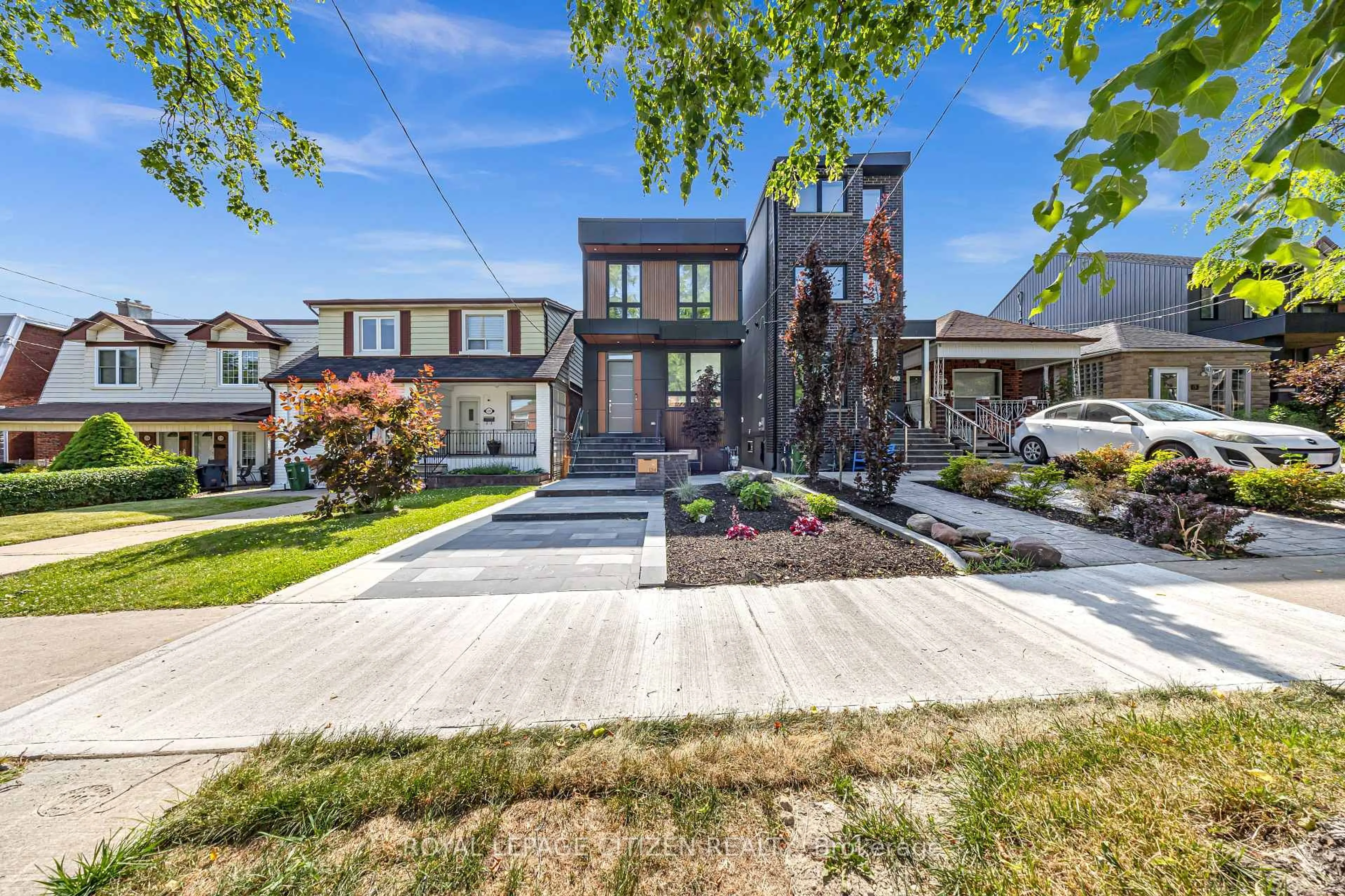 Home with brick exterior material, street for 124 Caledonia Rd, Toronto Ontario M6E 4S7