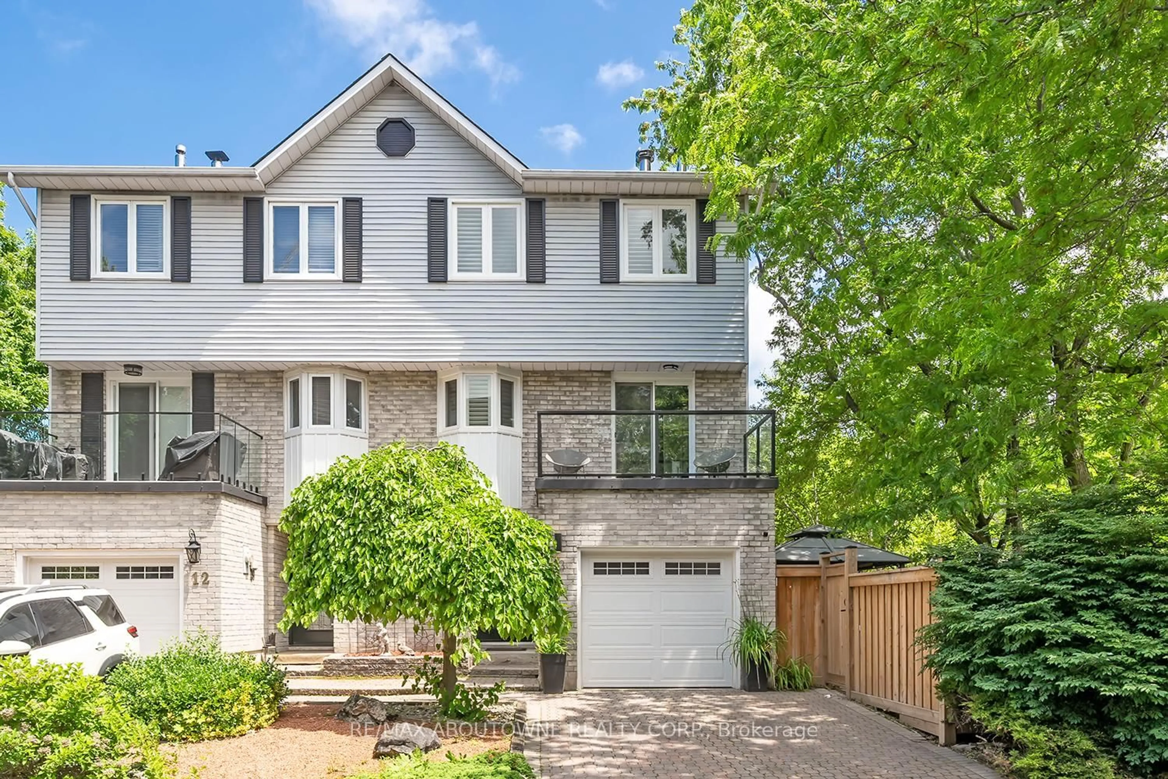 Home with brick exterior material, street for 2299 Marine Dr #13, Oakville Ontario L6L 1C2