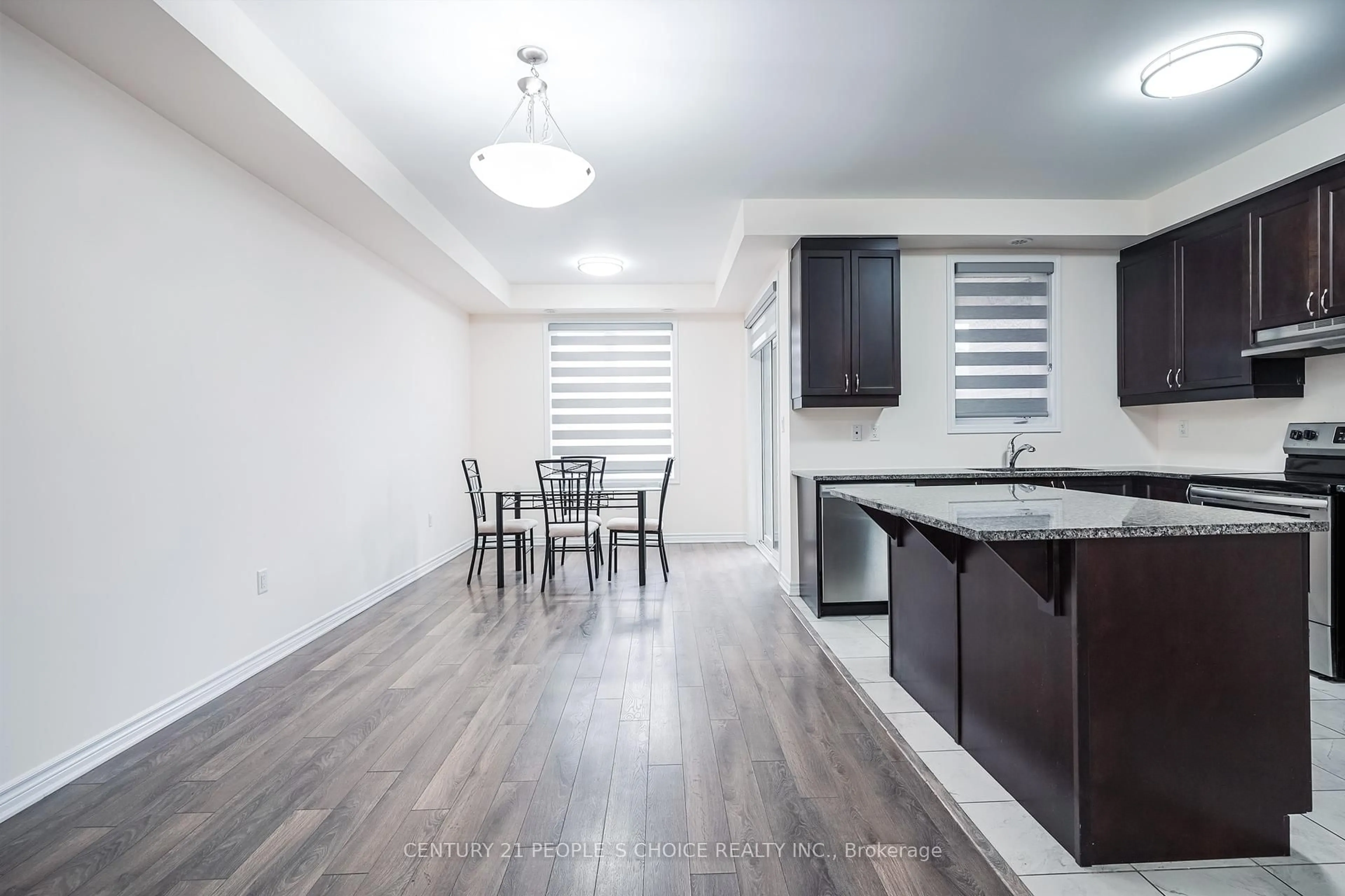 Open concept kitchen, wood/laminate floor for 51 Summer Wind Lane #42, Brampton Ontario L7A 5J2