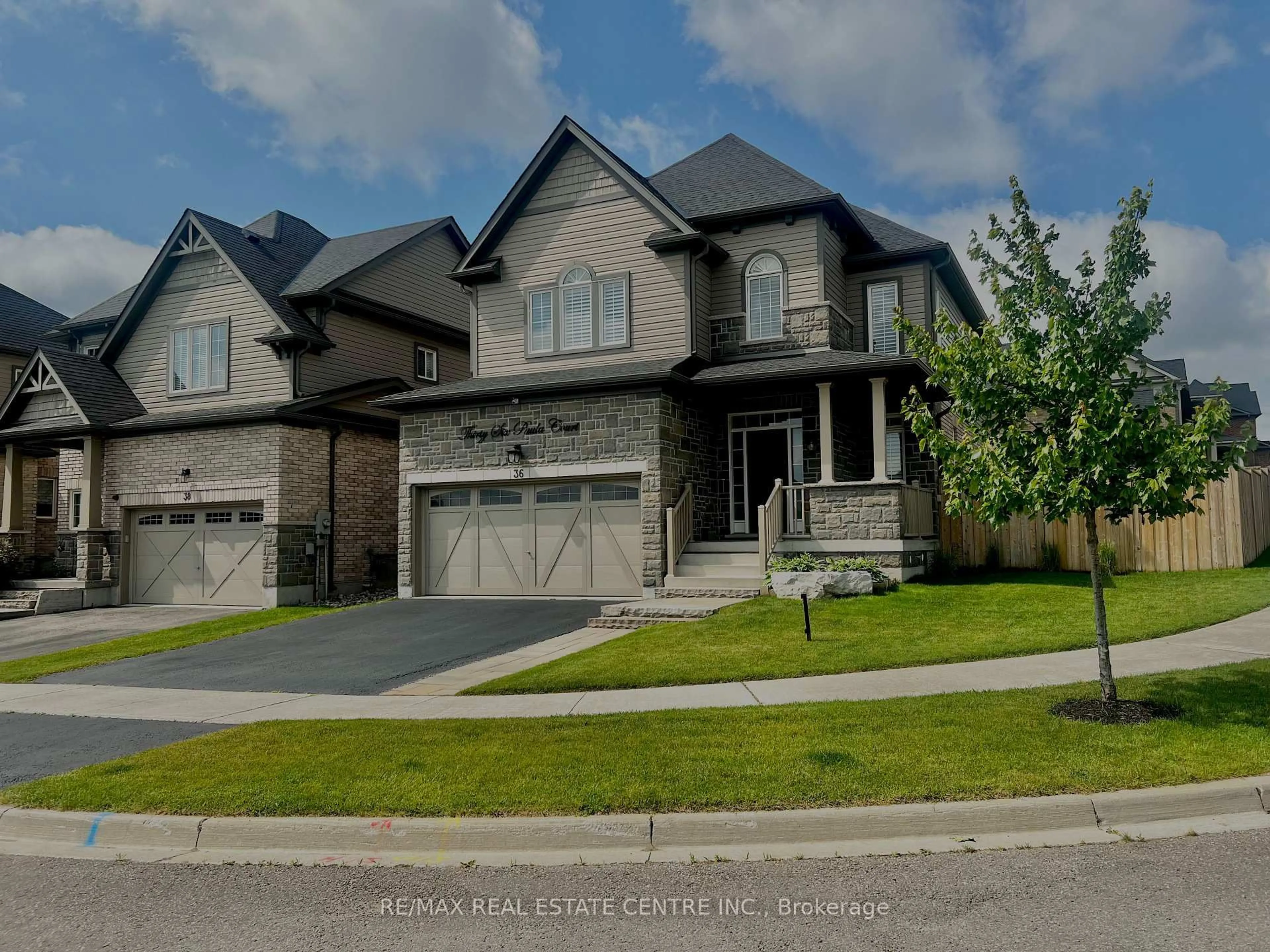 Home with brick exterior material, street for 36 Paula Crt, Orangeville Ontario L9W 5V1