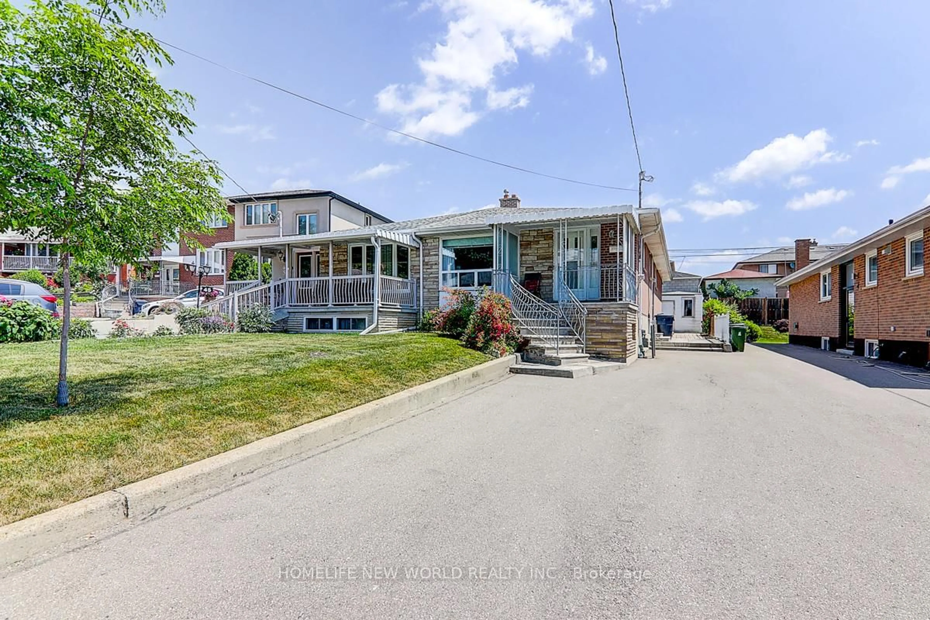 A pic from outside/outdoor area/front of a property/back of a property/a pic from drone, street for 43 Coquette Rd, Toronto Ontario M3L 1T1