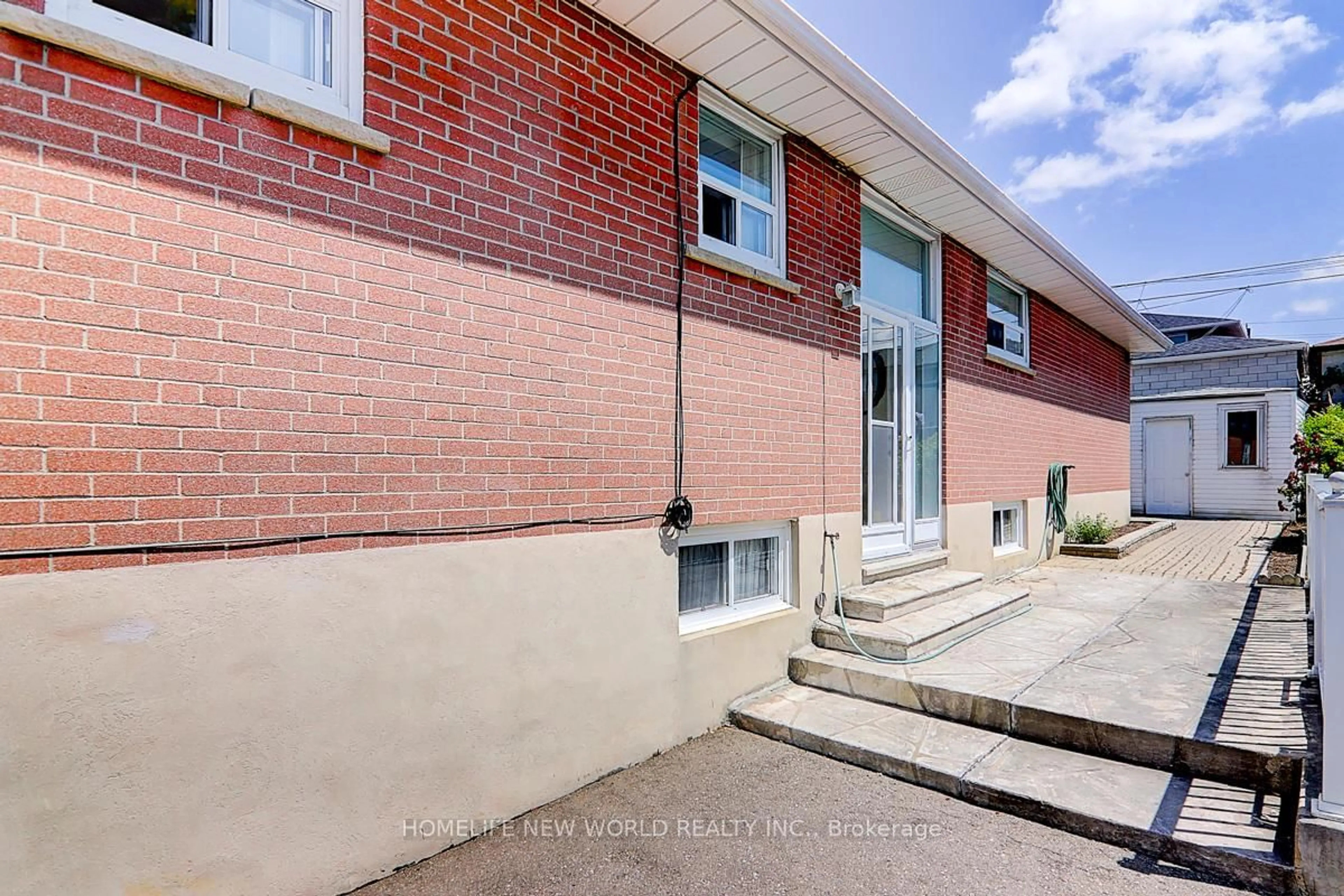 Home with brick exterior material, street for 43 Coquette Rd, Toronto Ontario M3L 1T1