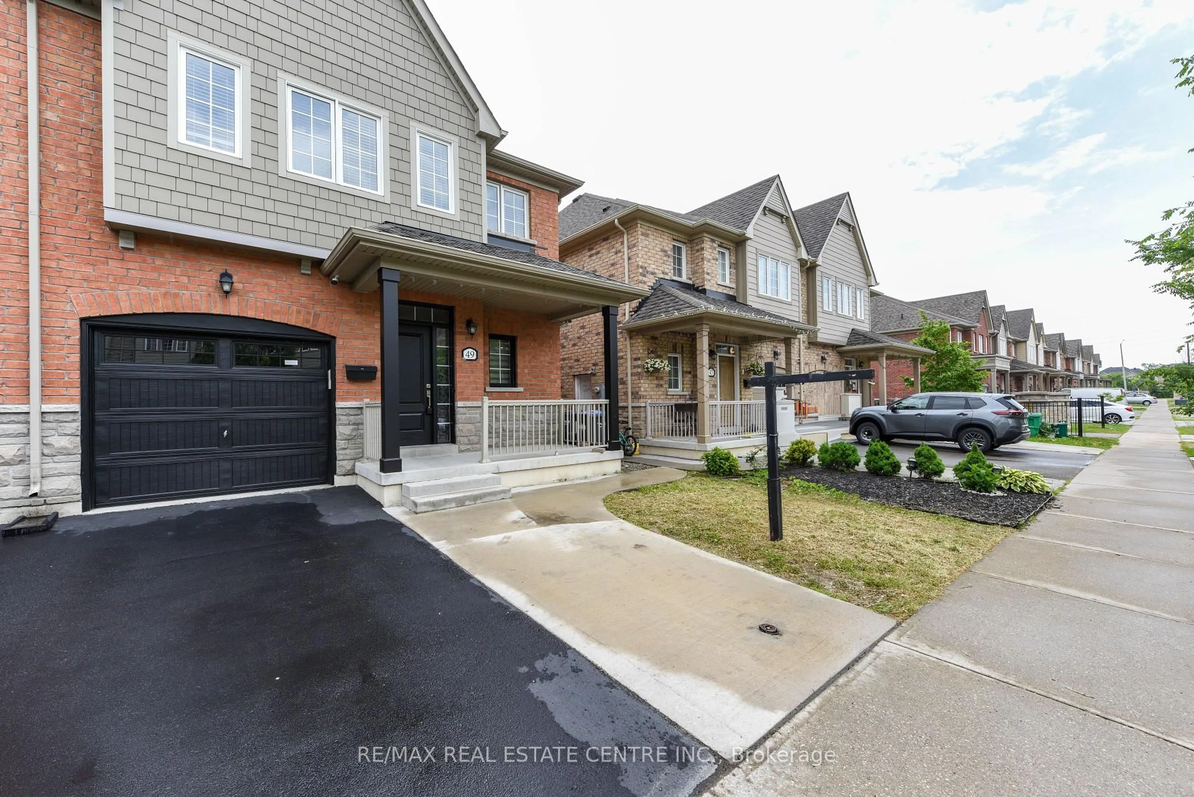 Home with brick exterior material, street for 49 Honeyview Tr, Brampton Ontario L6P 4A4