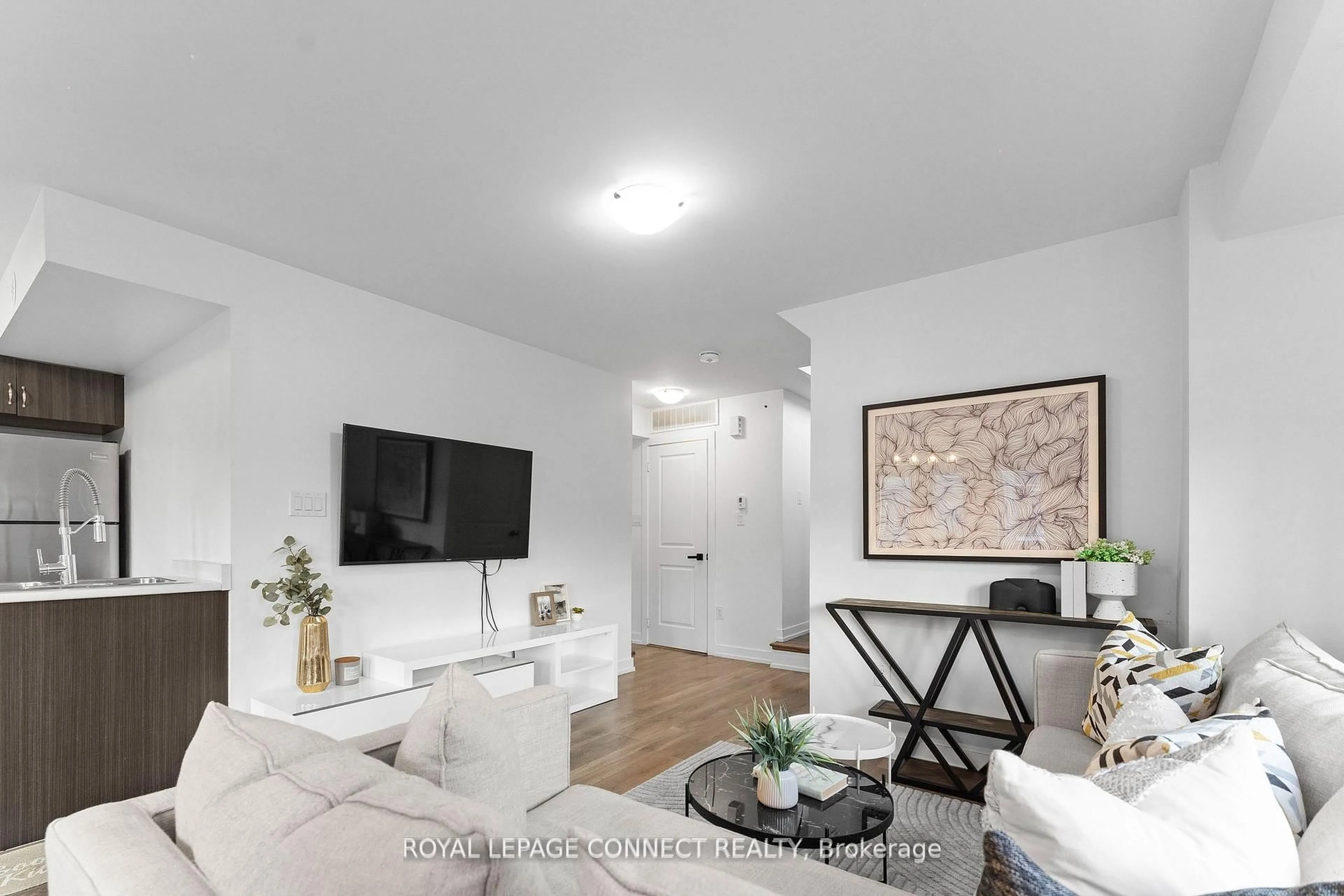 Living room with furniture, unknown for 80 Parrotta Dr #151, Toronto Ontario M9M 0B5
