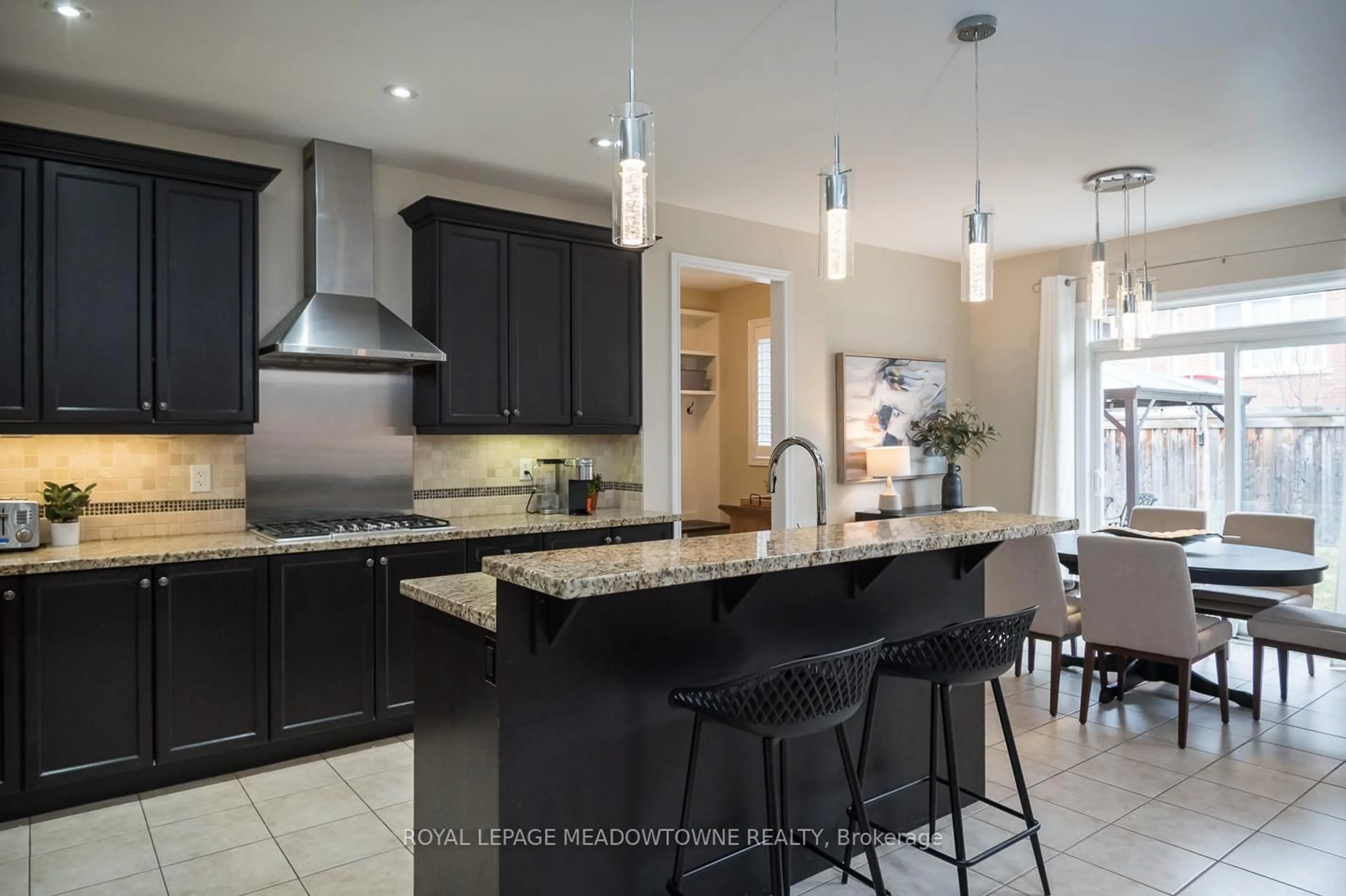 Open concept kitchen, ceramic/tile floor for 476 Laundon Terr, Milton Ontario L9T 7X9