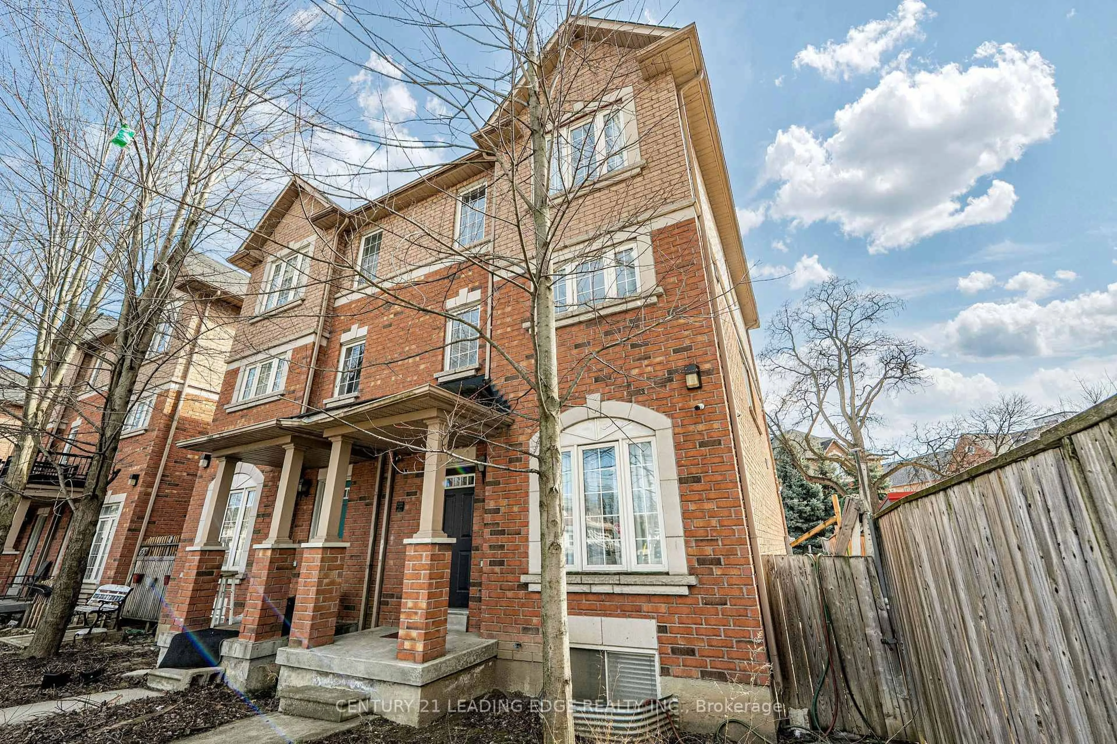 Home with brick exterior material, street for 75 Elphick Lane, Toronto Ontario M9N 4A2