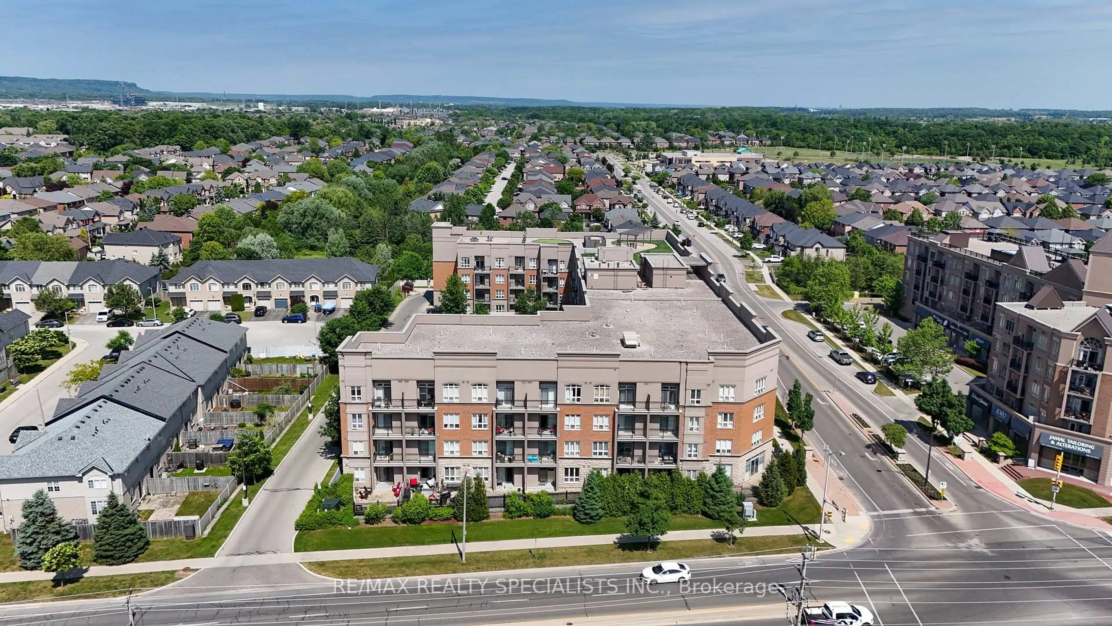 A pic from outside/outdoor area/front of a property/back of a property/a pic from drone, unknown for 5317 Upper Middle Rd #430, Burlington Ontario L7L 0G8