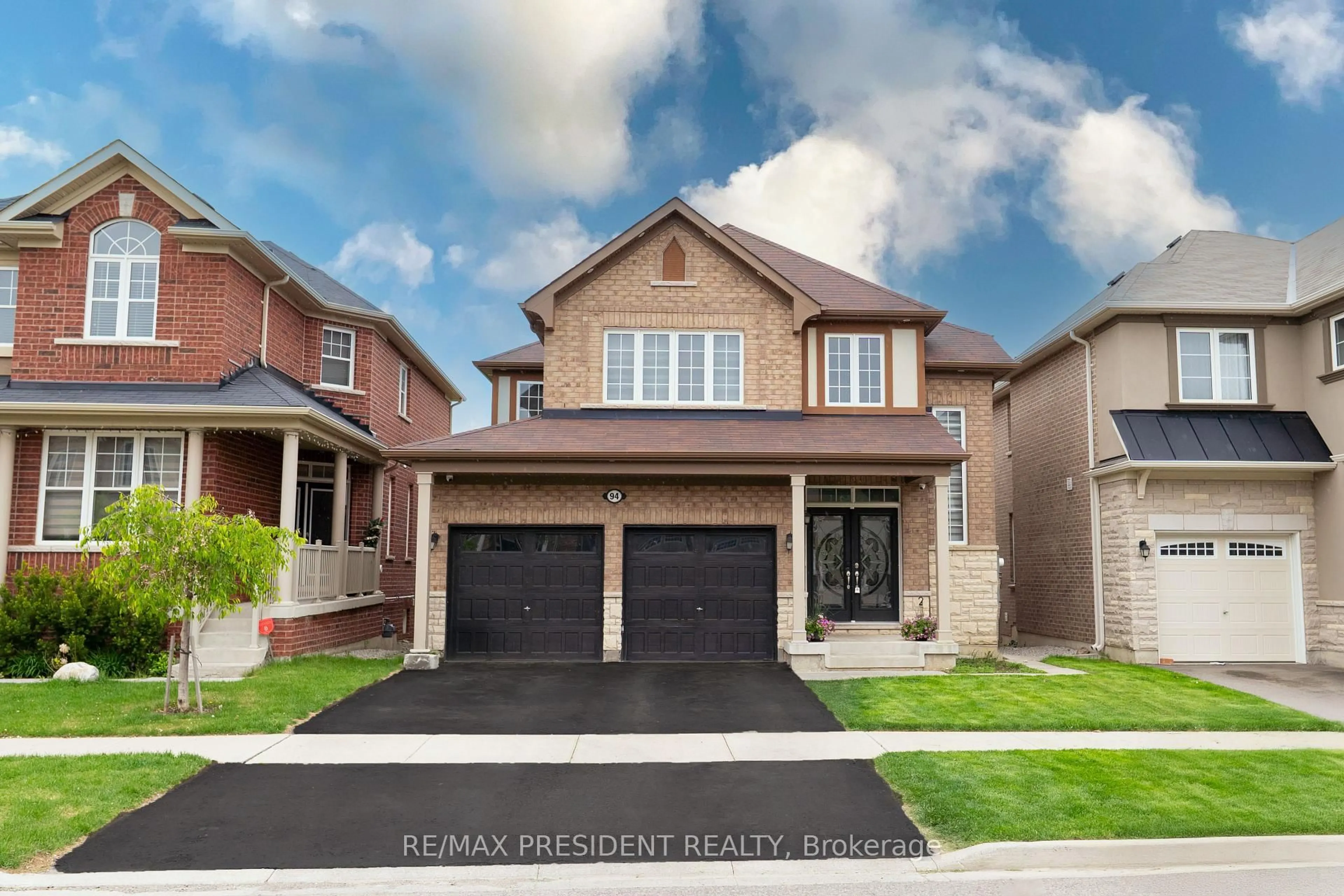 Home with brick exterior material, street for 94 Mincing Tr, Brampton Ontario L7A 4S9