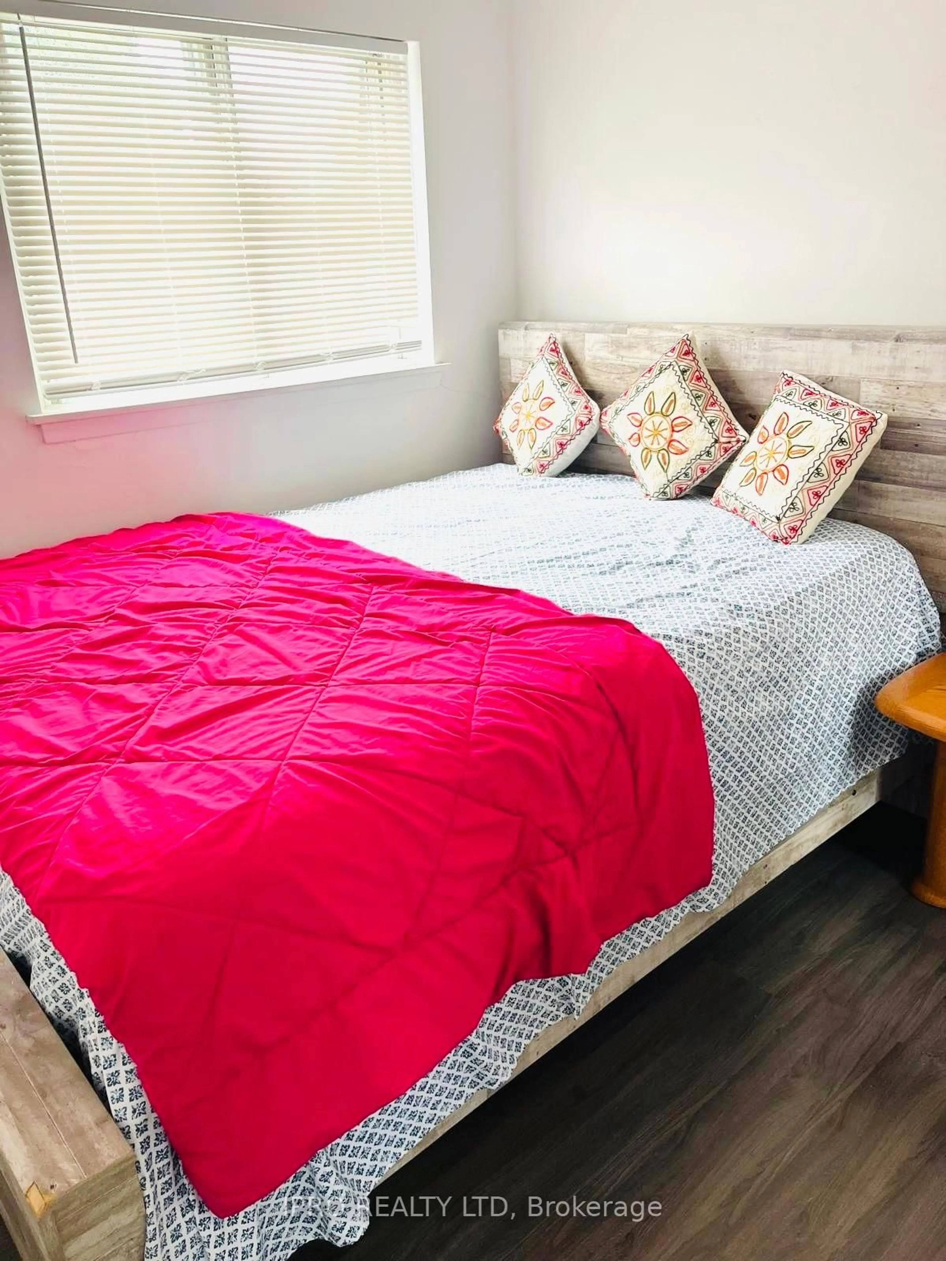Bedroom with bed, wood/laminate floor for 38 Tindale Rd, Brampton Ontario L6V 2G9