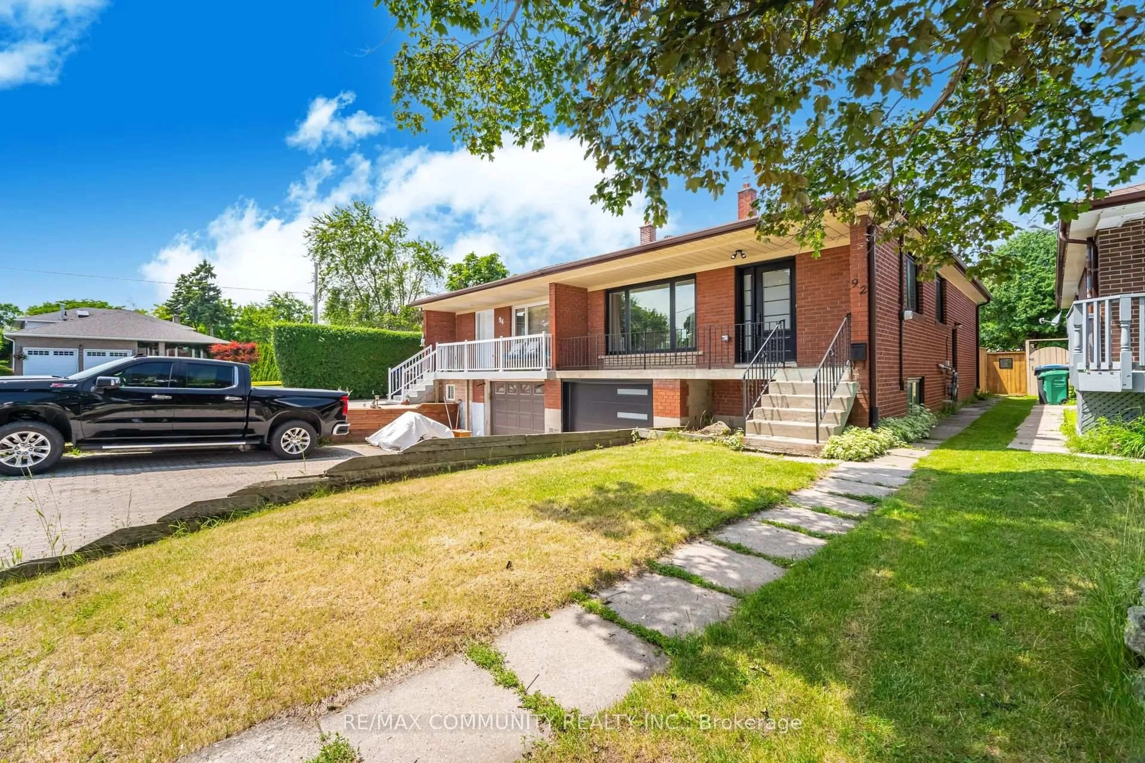 Home with brick exterior material, street for 92 Archibald St, Brampton Ontario L6X 1L9