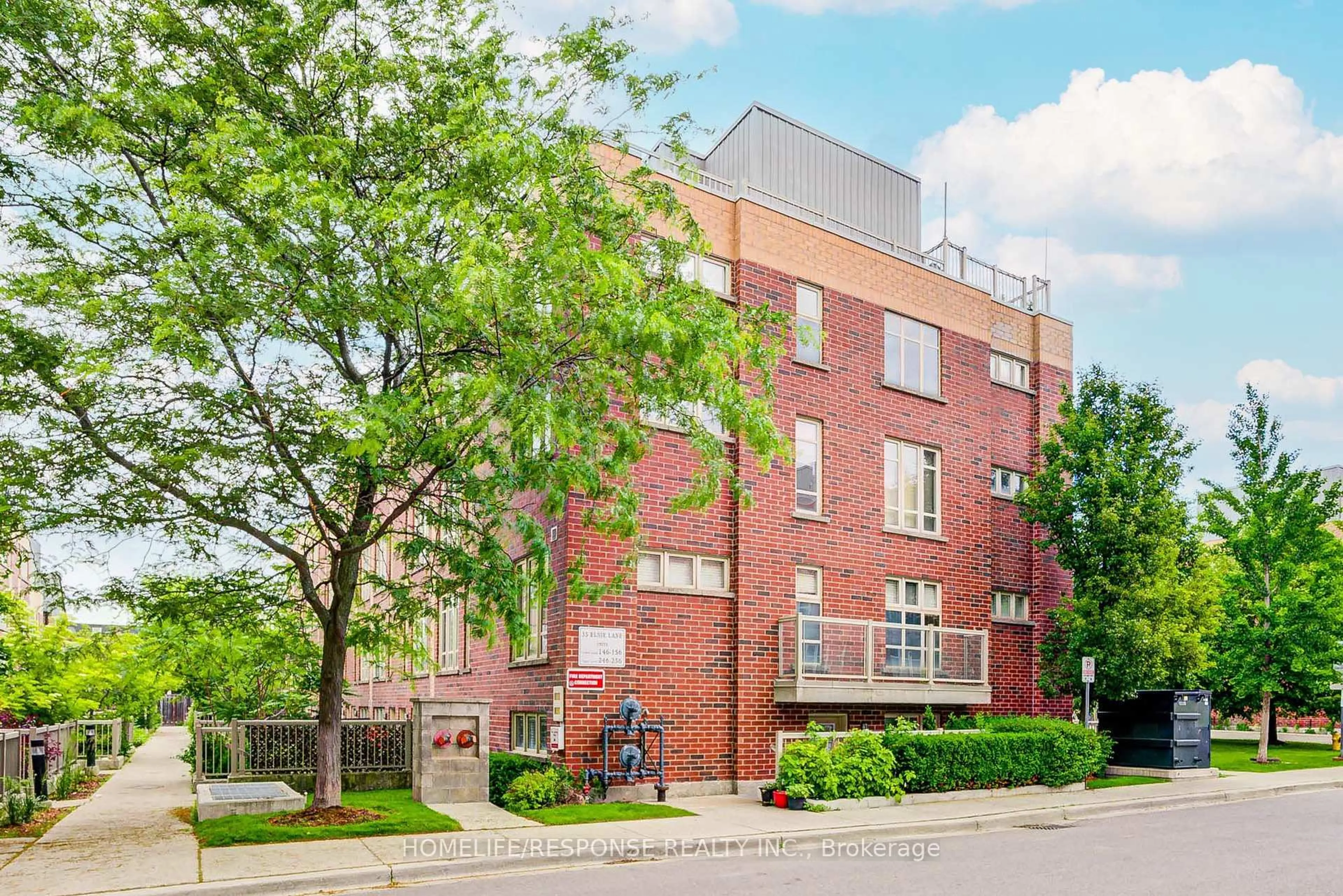 Home with brick exterior material, street for 35 Elsie Lane #149, Toronto Ontario M6P 3N3
