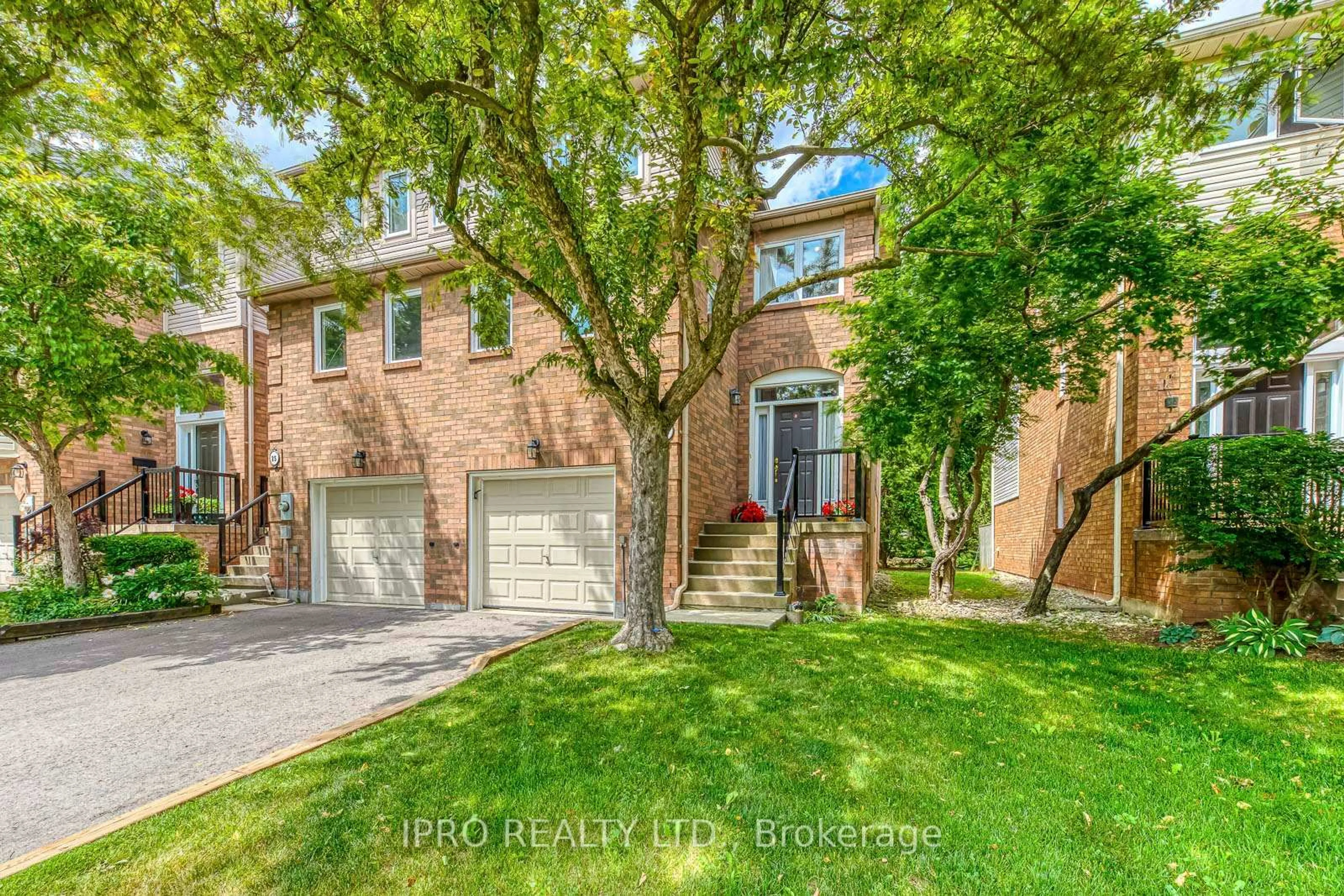 Home with brick exterior material, street for 2051 MERCHANTS Gate #26, Oakville Ontario L6M 3H6