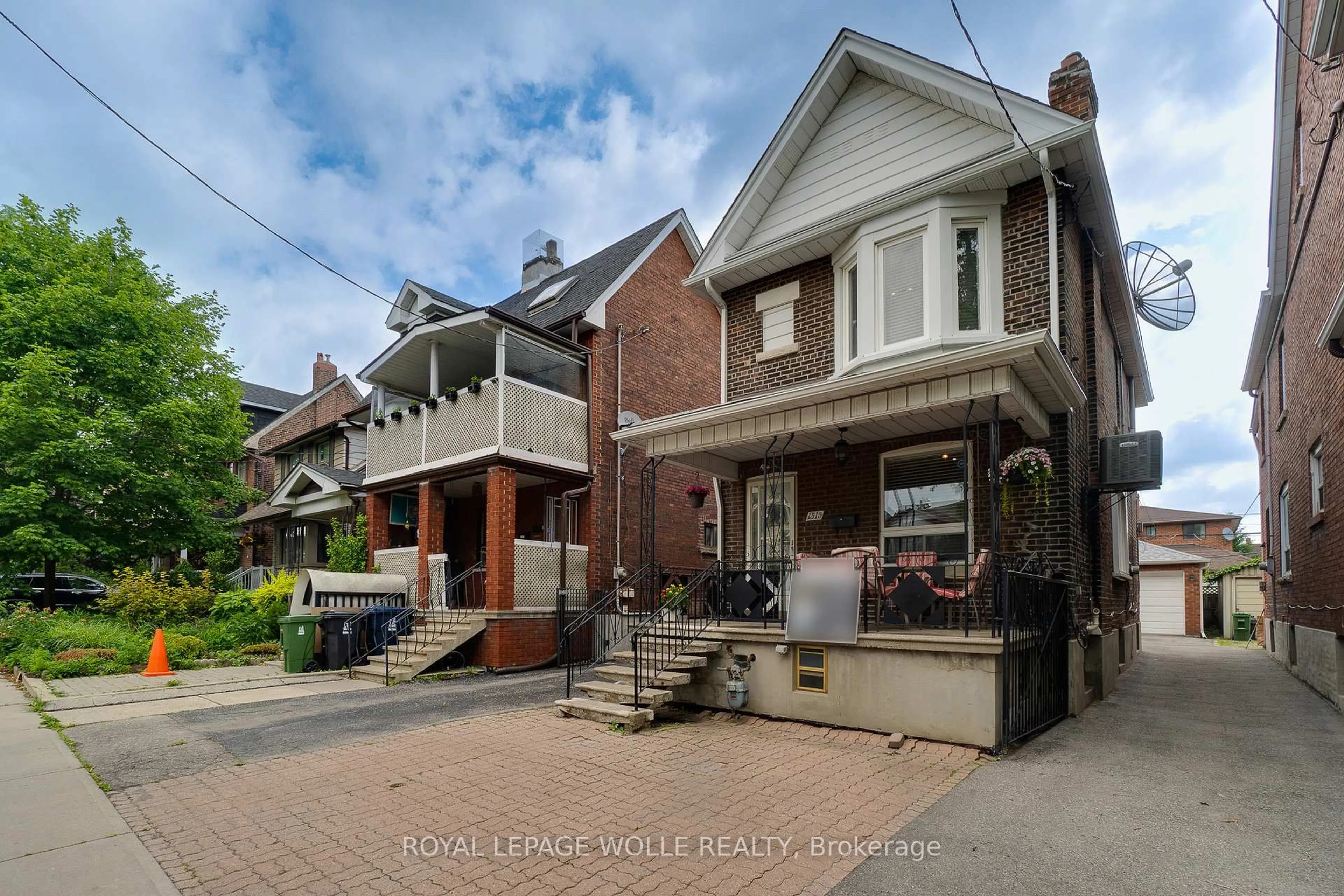 Home with brick exterior material, street for 1315 Lansdowne Ave, Toronto Ontario M6H 3Z9