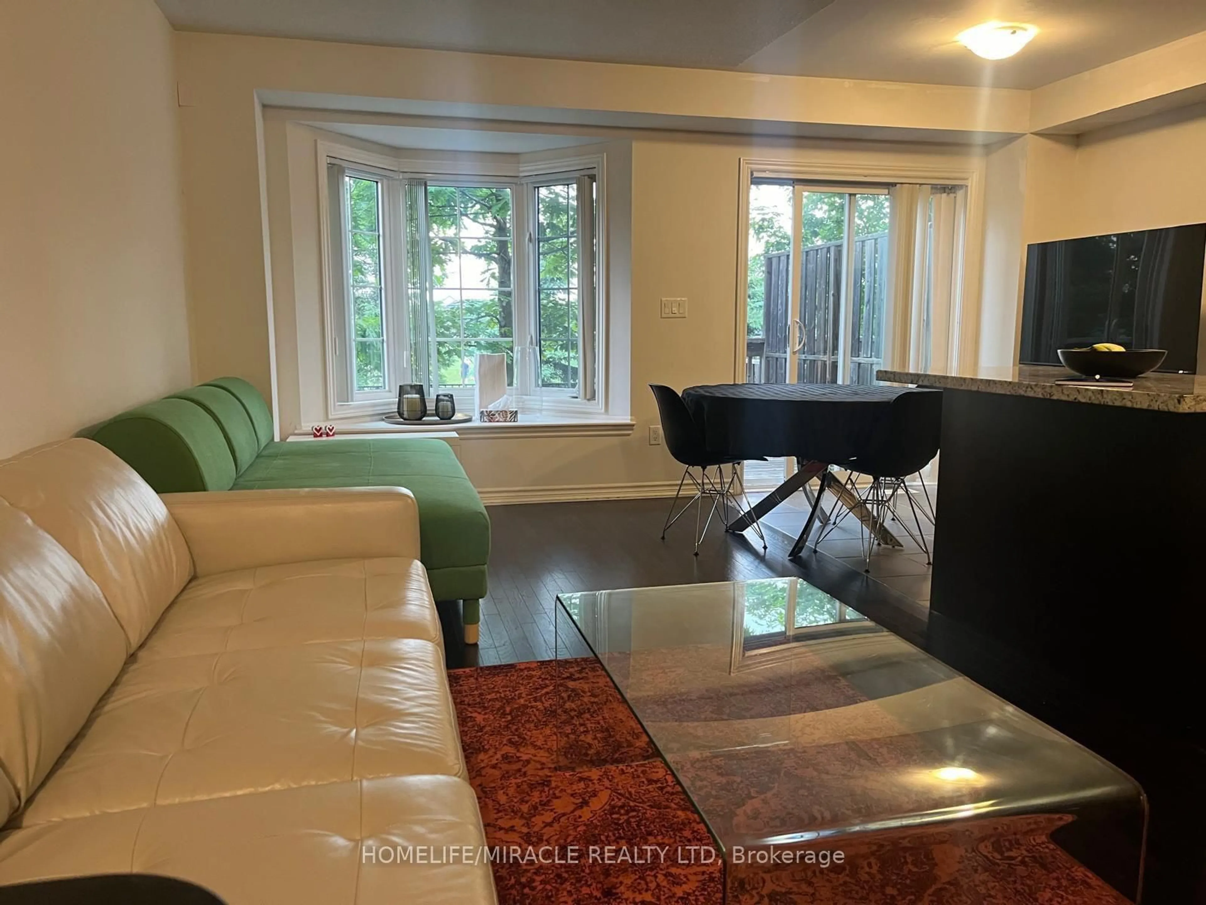 Living room with furniture, unknown for 5060 Harvard Rd #5, Mississauga Ontario L5M 0X1