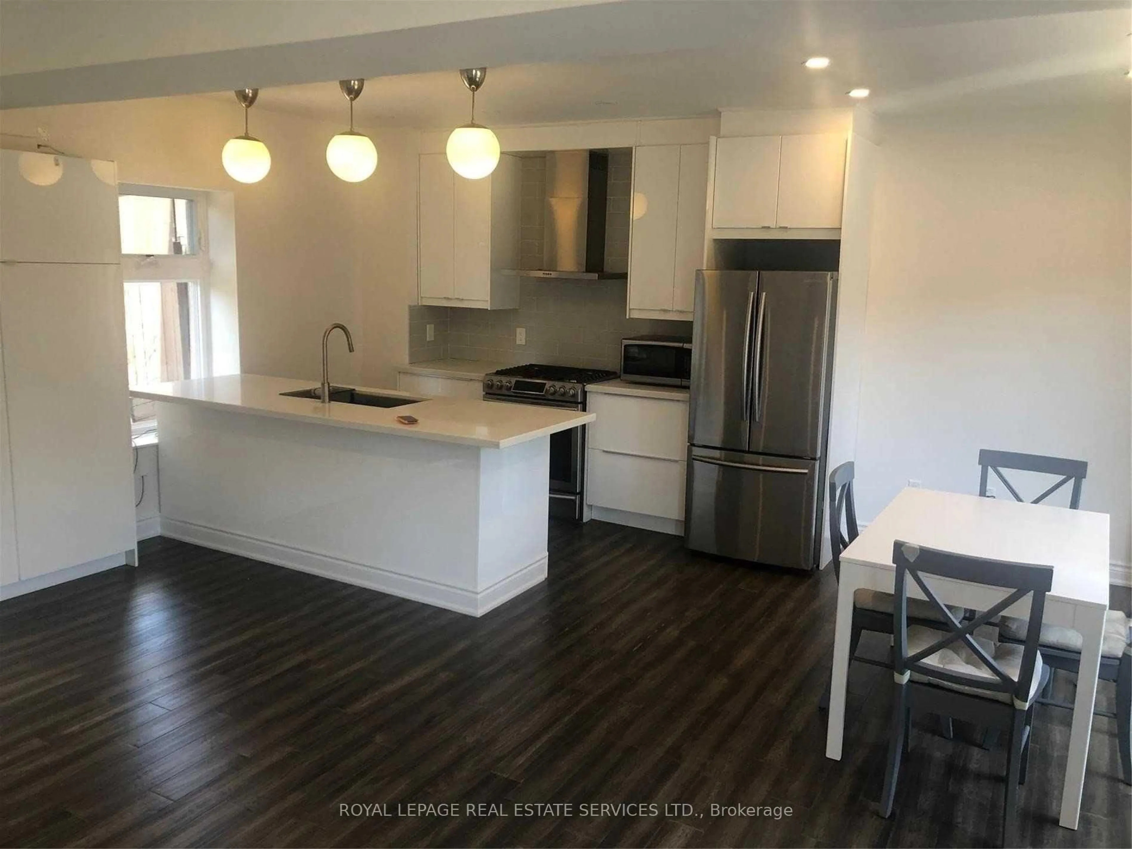 Open concept kitchen, unknown for 250 Boon Ave, Toronto Ontario M6E 3Z8