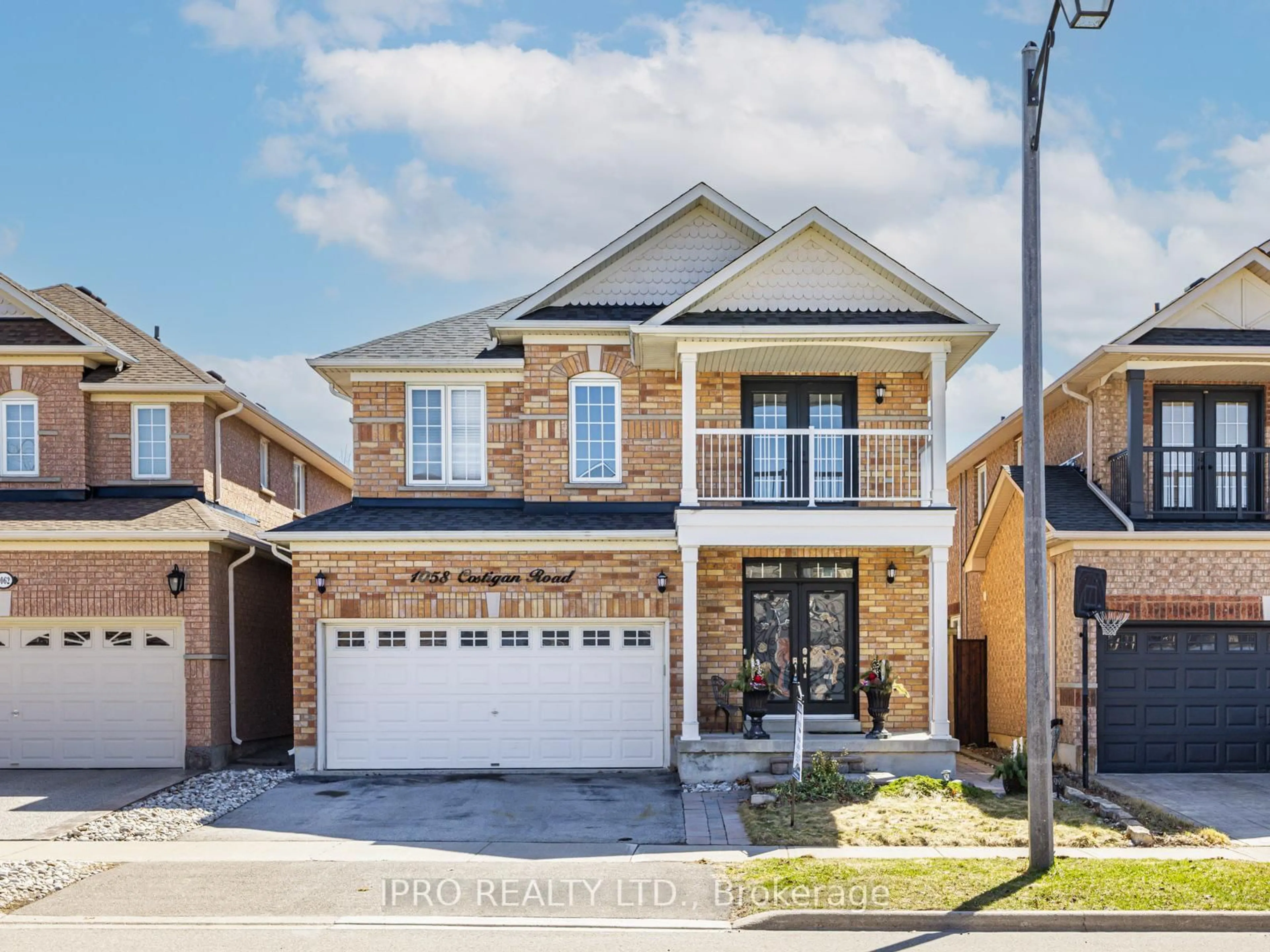 Home with brick exterior material, street for 1058 Costigan Rd, Milton Ontario L9T 6N6