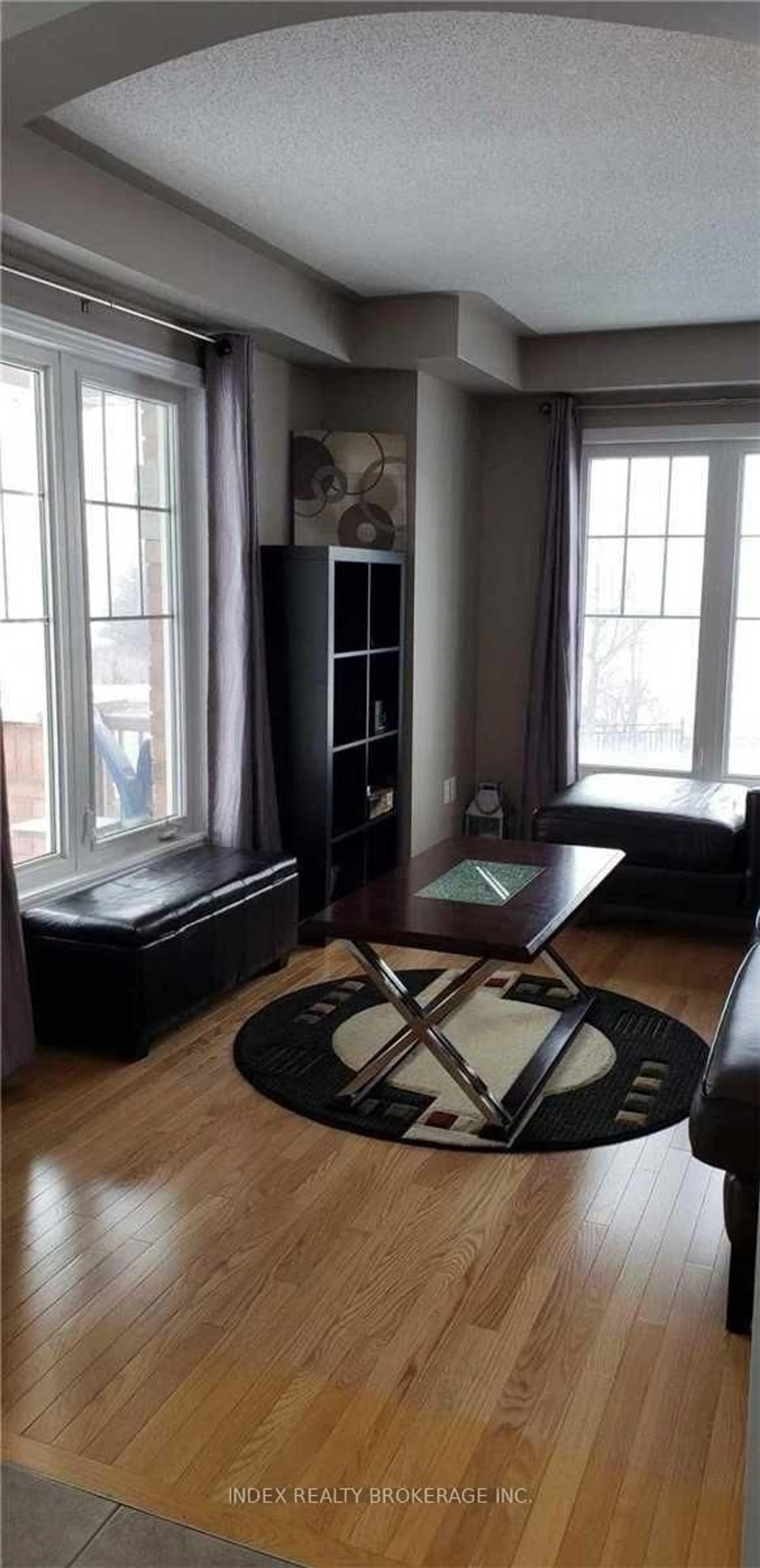 Living room with furniture, wood/laminate floor for 2 Seachart Pl, Brampton Ontario L6P 3E1