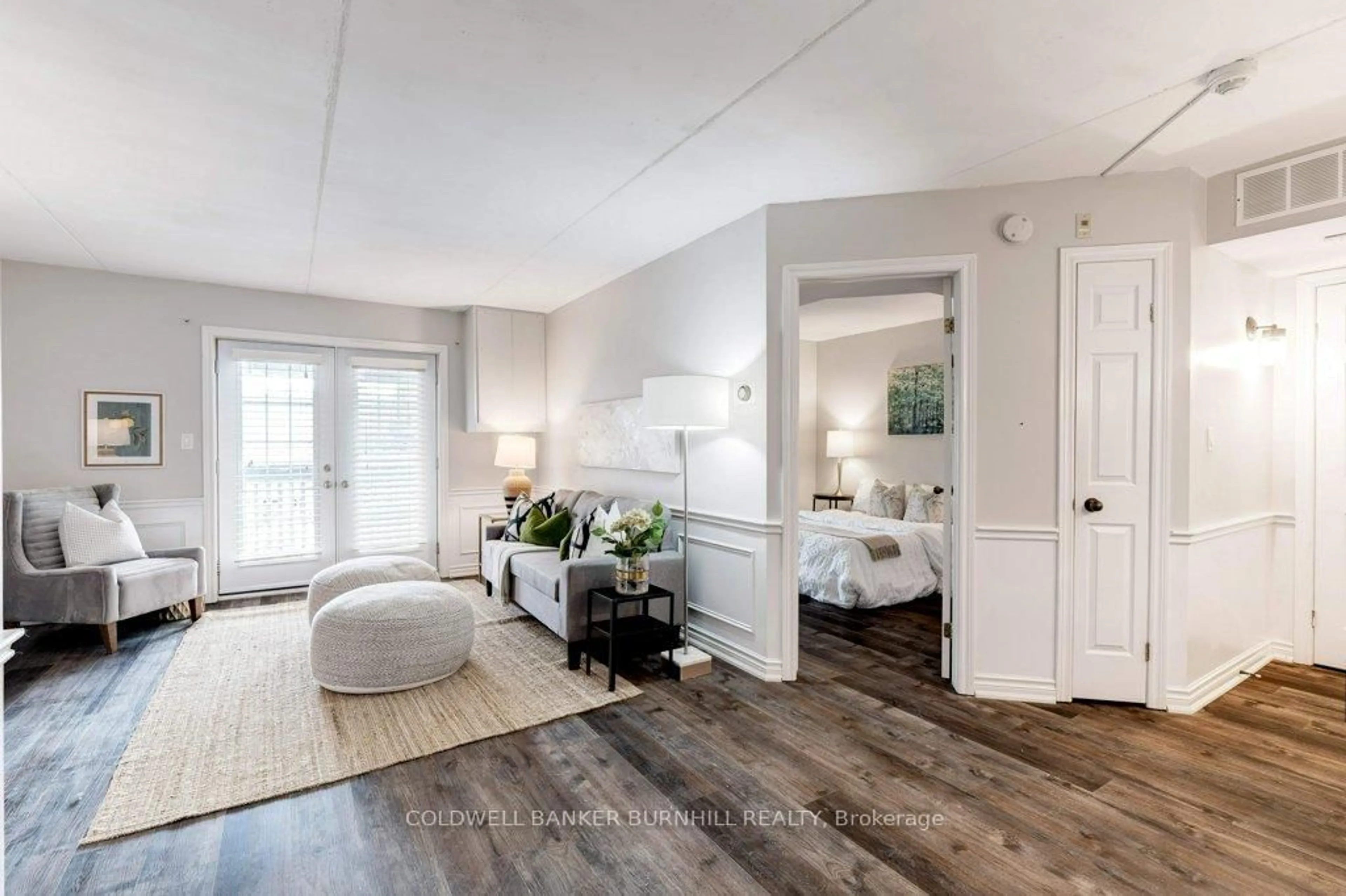 Living room with furniture, wood/laminate floor for 2040 Cleaver Ave #206, Burlington Ontario L7M 4C4