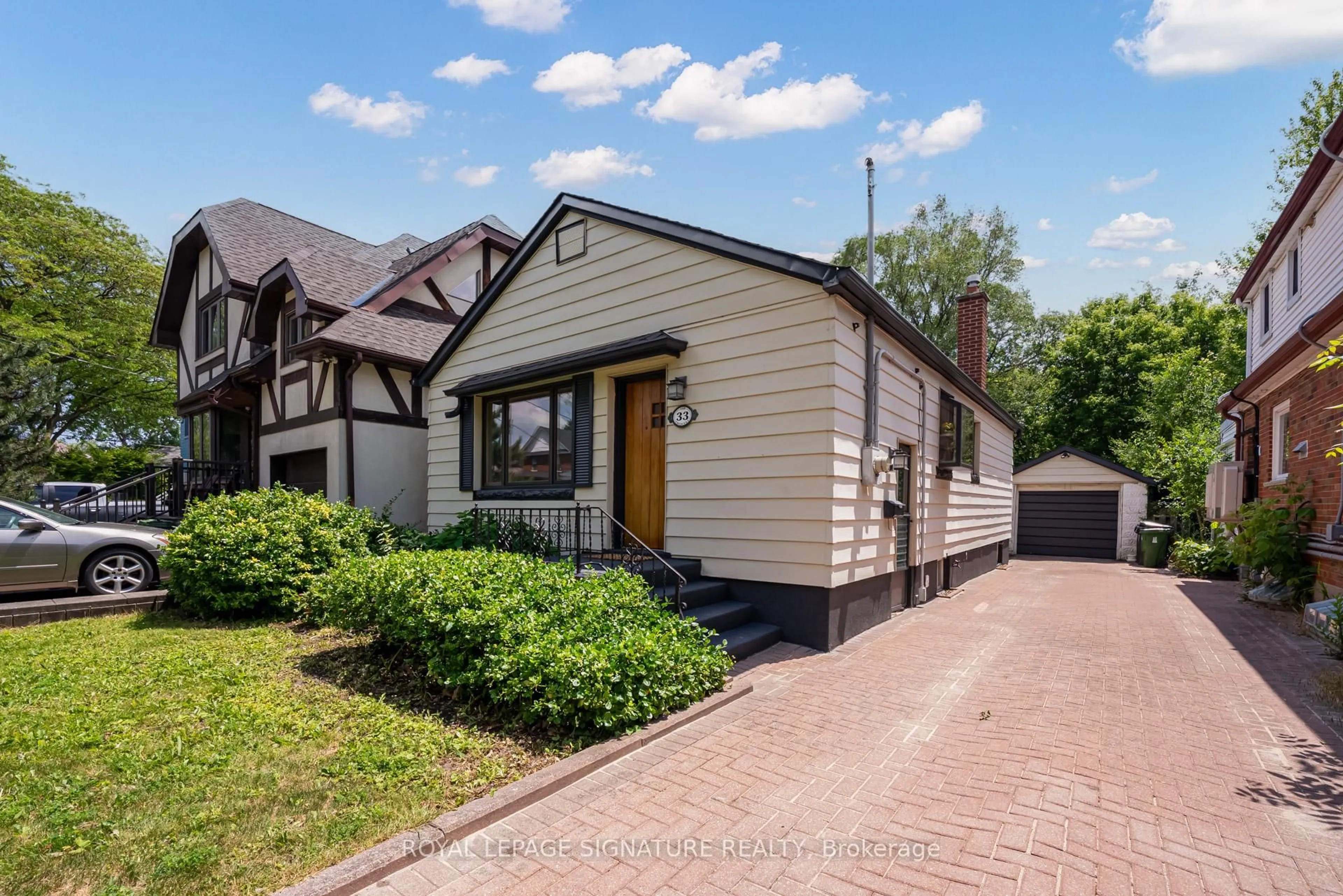 Home with brick exterior material, street for 33 Ash Cres, Toronto Ontario M8W 1E4