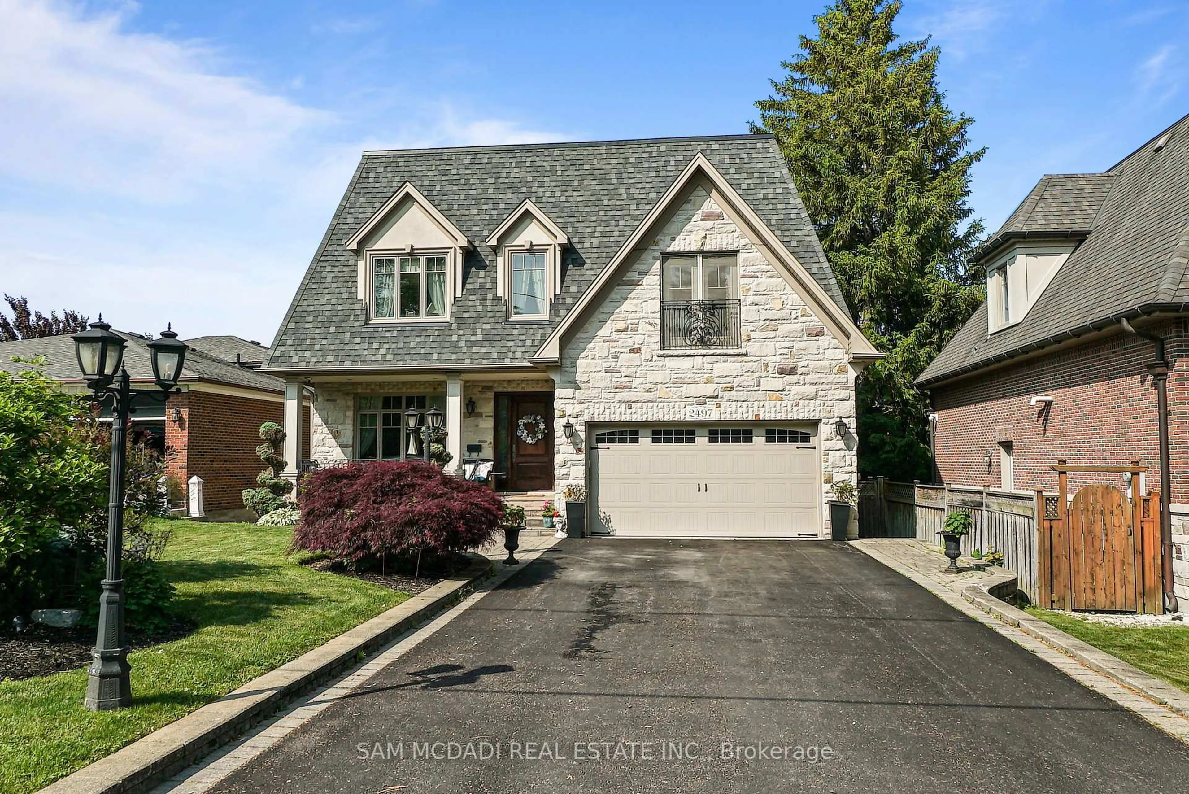 Home with brick exterior material, street for 2497 Sharon Cres, Mississauga Ontario L5C 1Y9