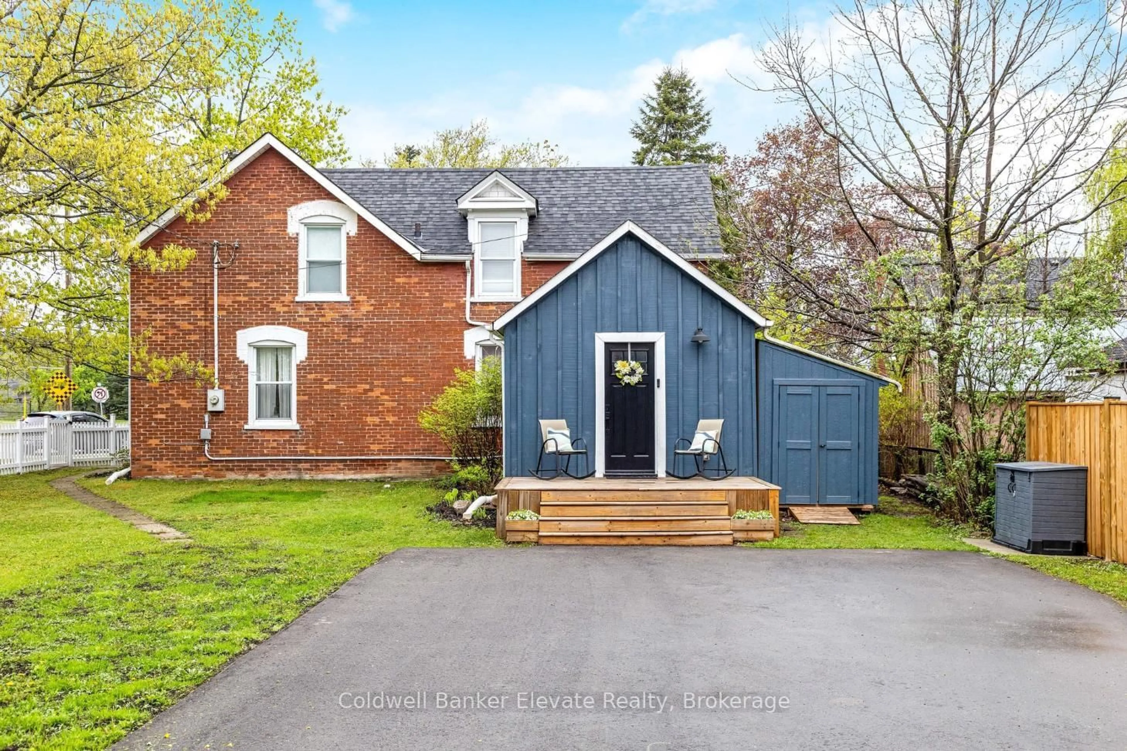 Home with brick exterior material, street for 243 Queen St, Halton Hills Ontario L7J 1P7