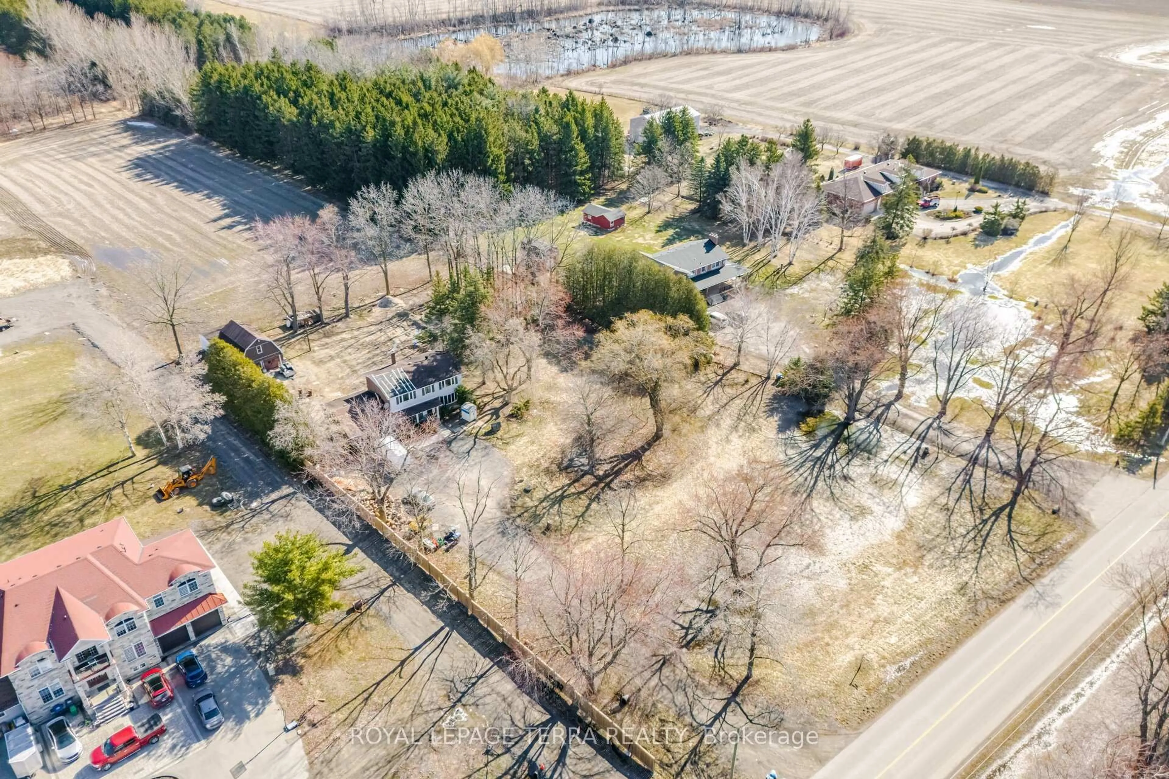 A pic from outside/outdoor area/front of a property/back of a property/a pic from drone, forest/trees view for 14457 Bramalea Rd, Caledon Ontario L7C 2R4